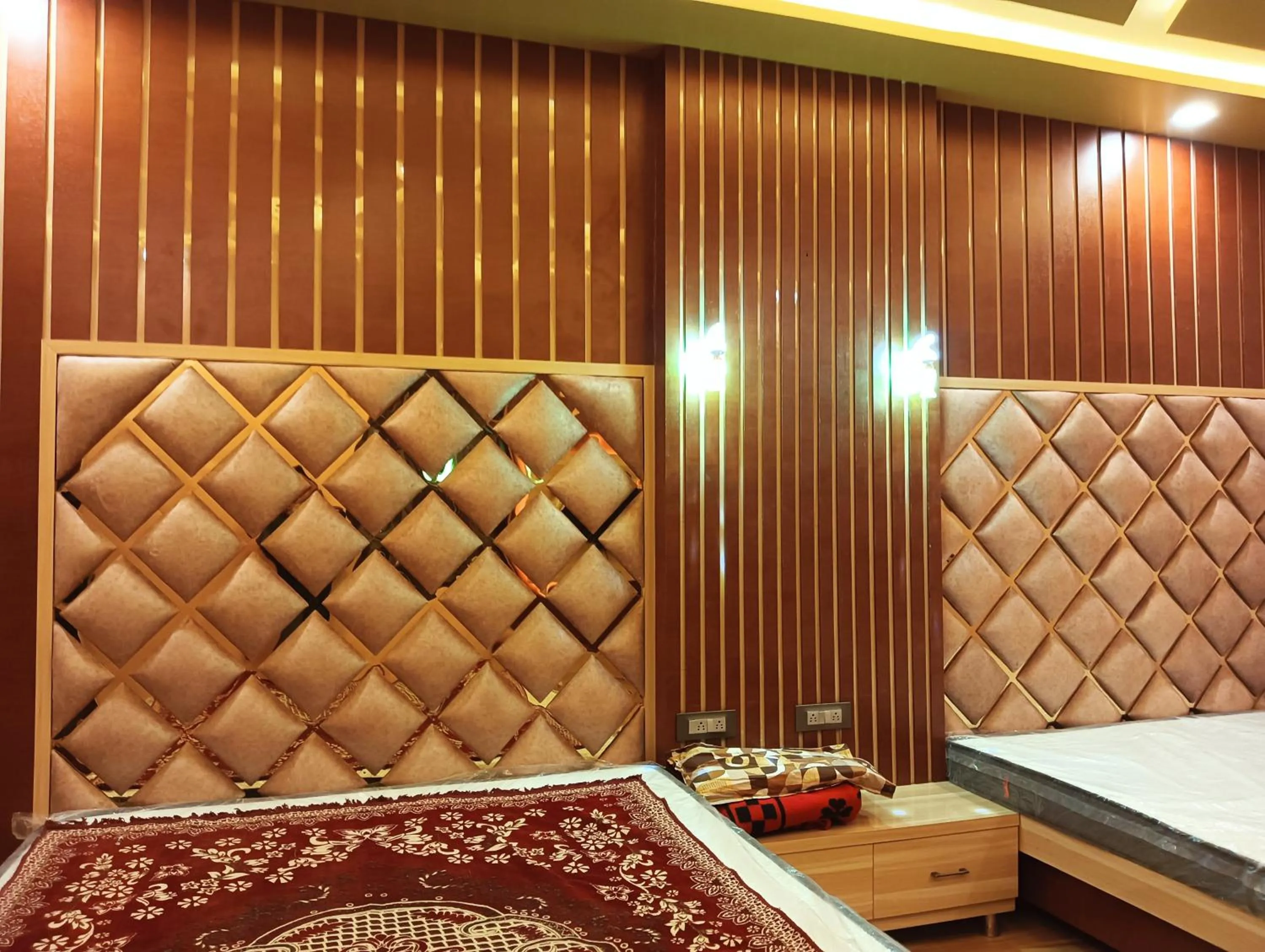 Bed in Hotel Ashok Vihar