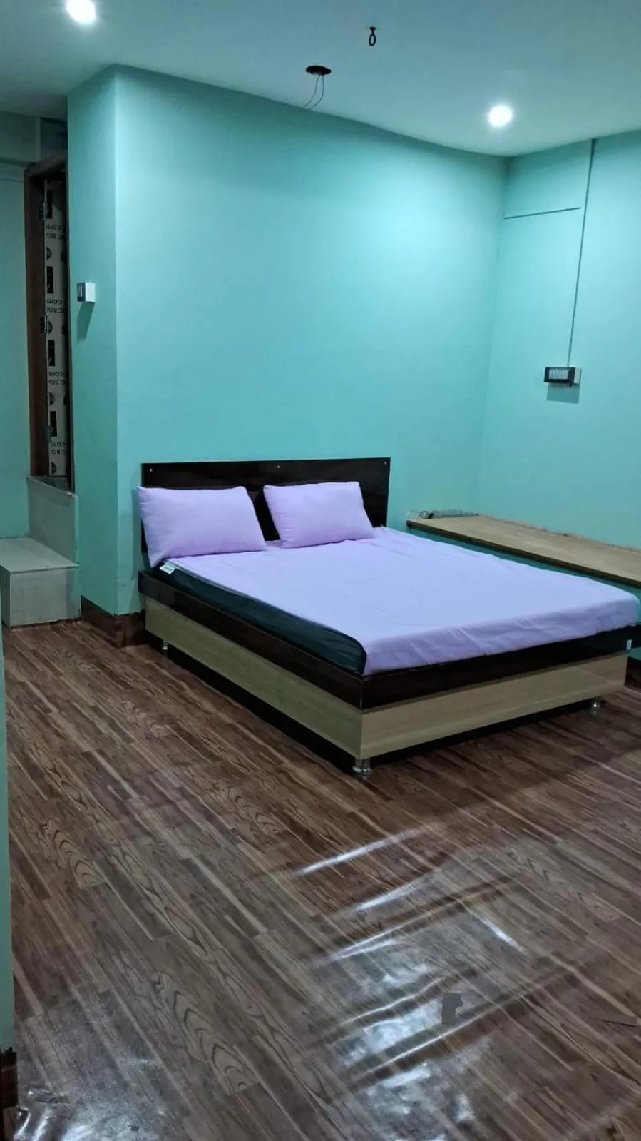 Bed in Hotel Ashok Vihar