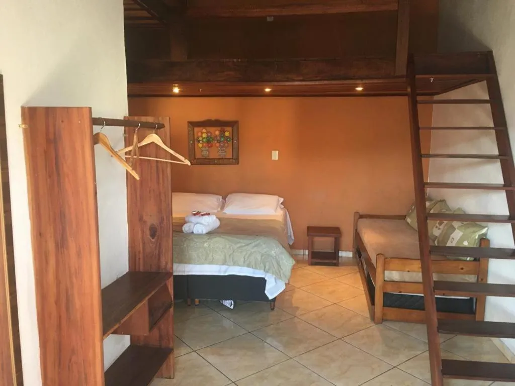 Photo of the whole room, Bed in Pousada Mar & Vida e Doçaria