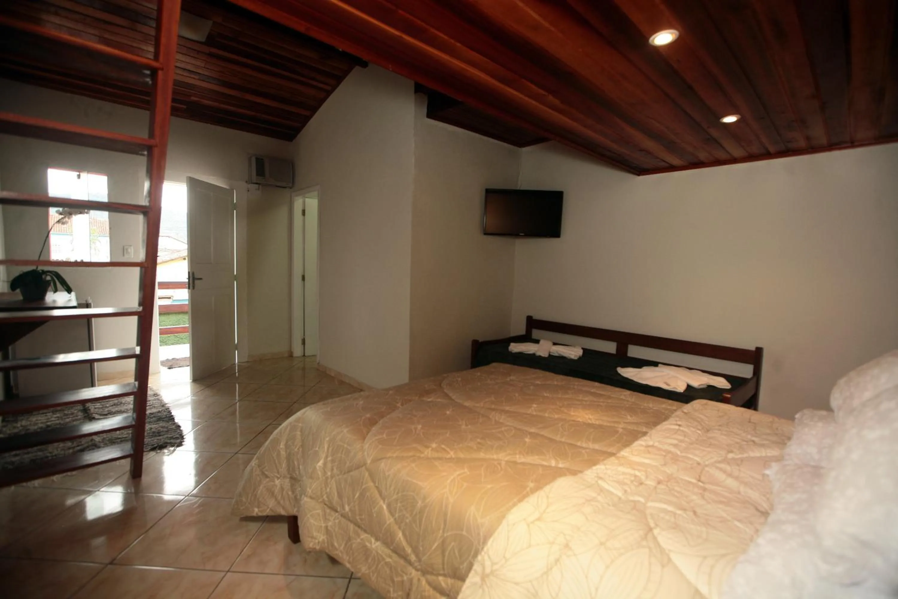 Bed in Pousada Mar & Vida e Doçaria