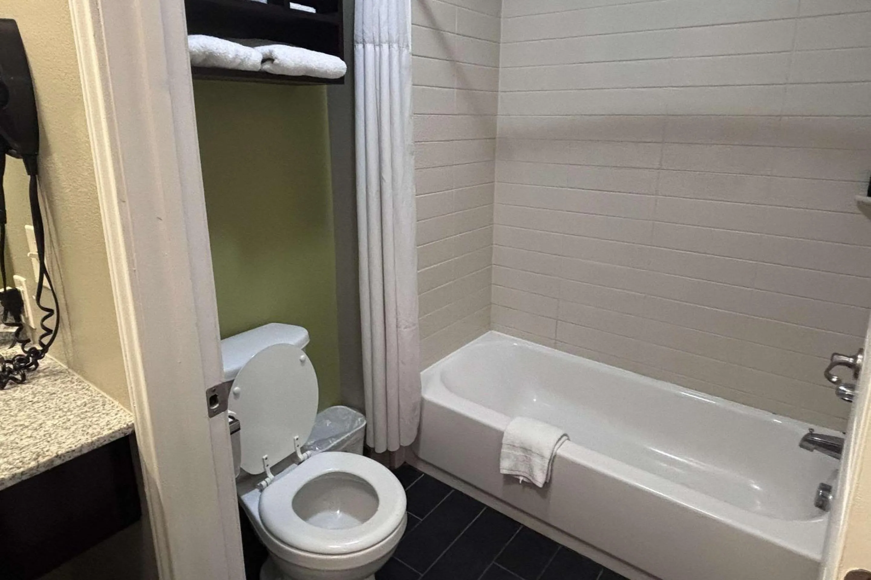 Bedroom in Rodeway Inn