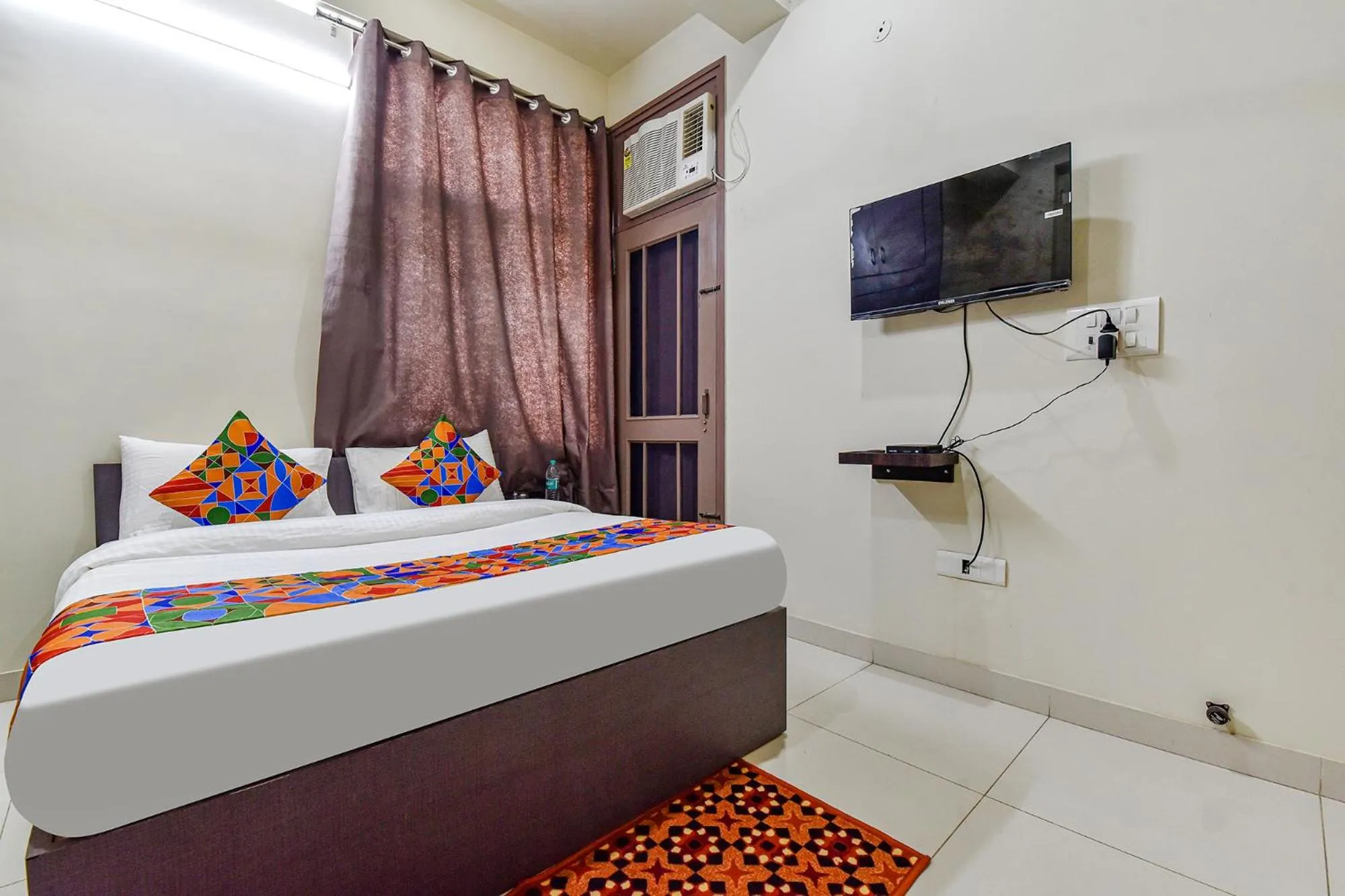 Bed in FabHotel Moon Light Palace