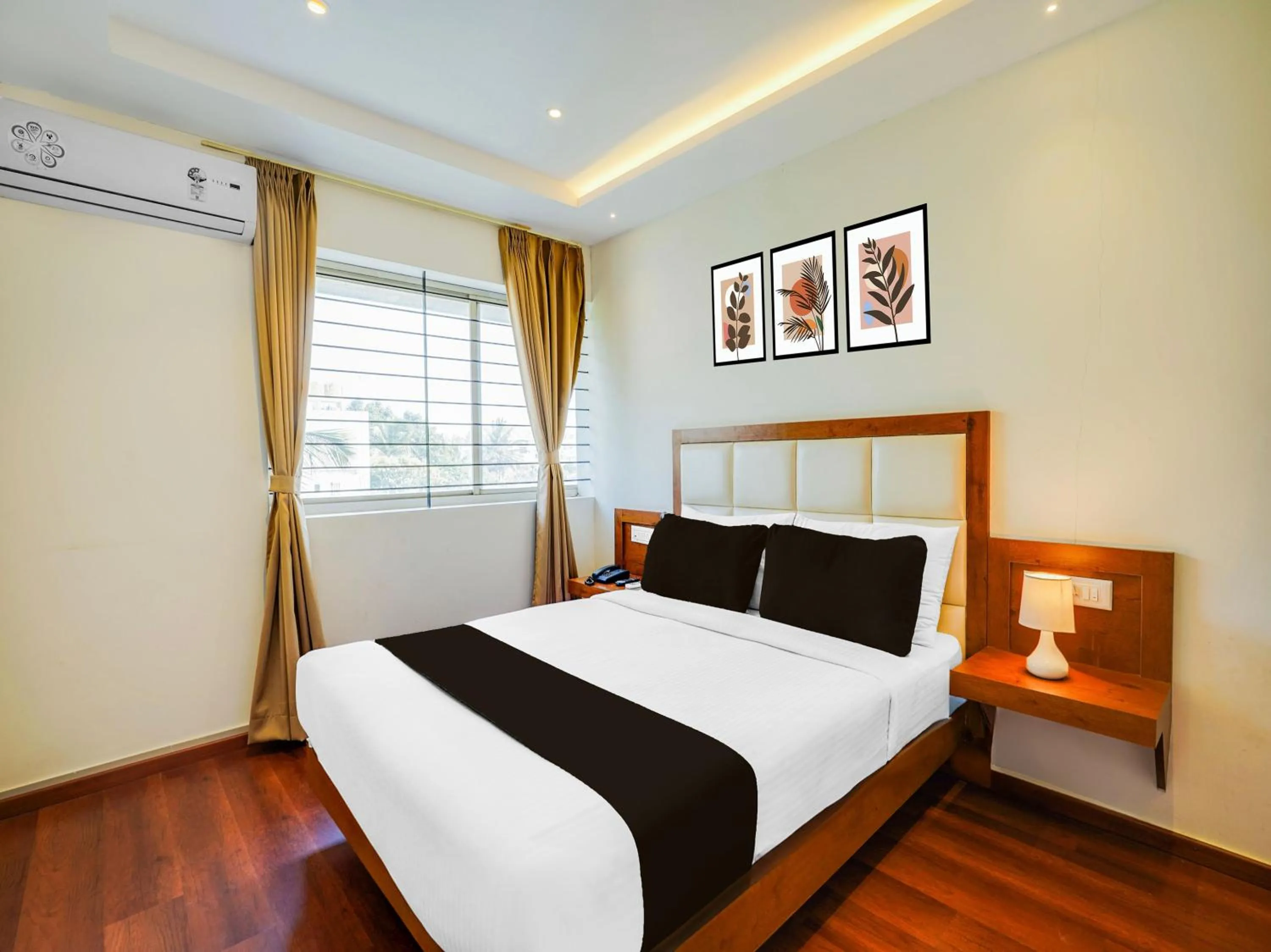 Bedroom, Bed in Super Townhouse Ramamurthy Nagar West Formerly Phoenix Hotel