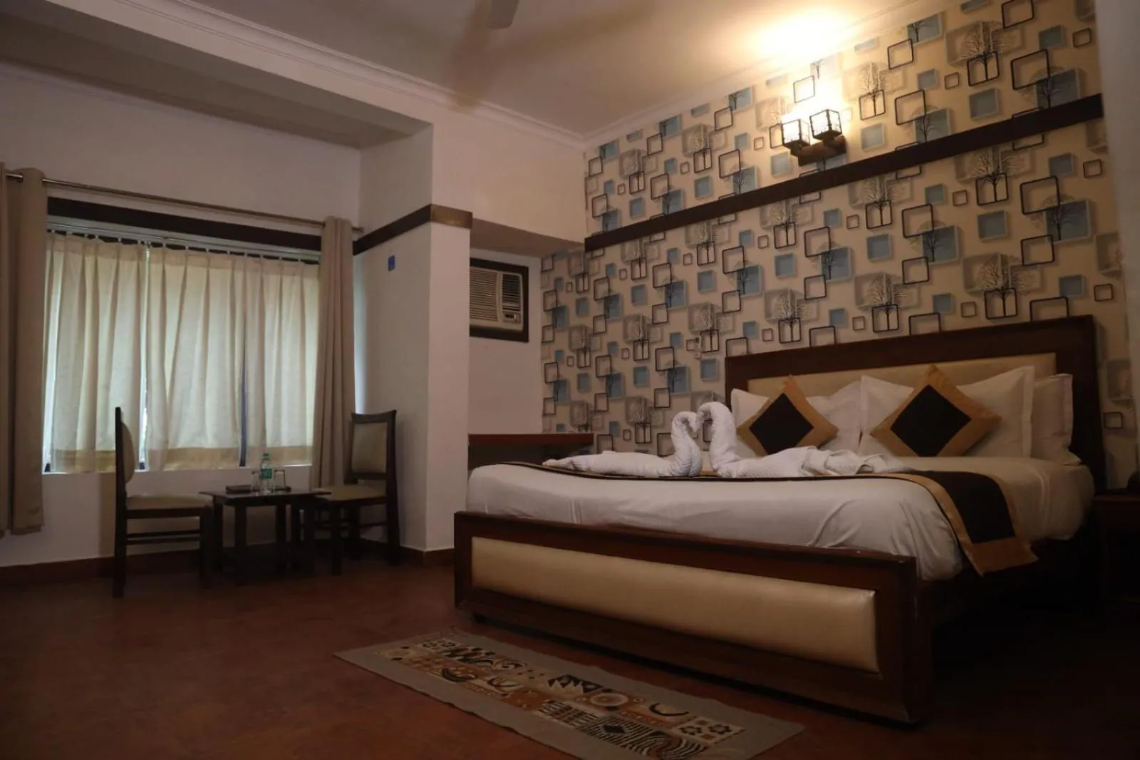 Seating area, Bed in Maya The Forest Resort