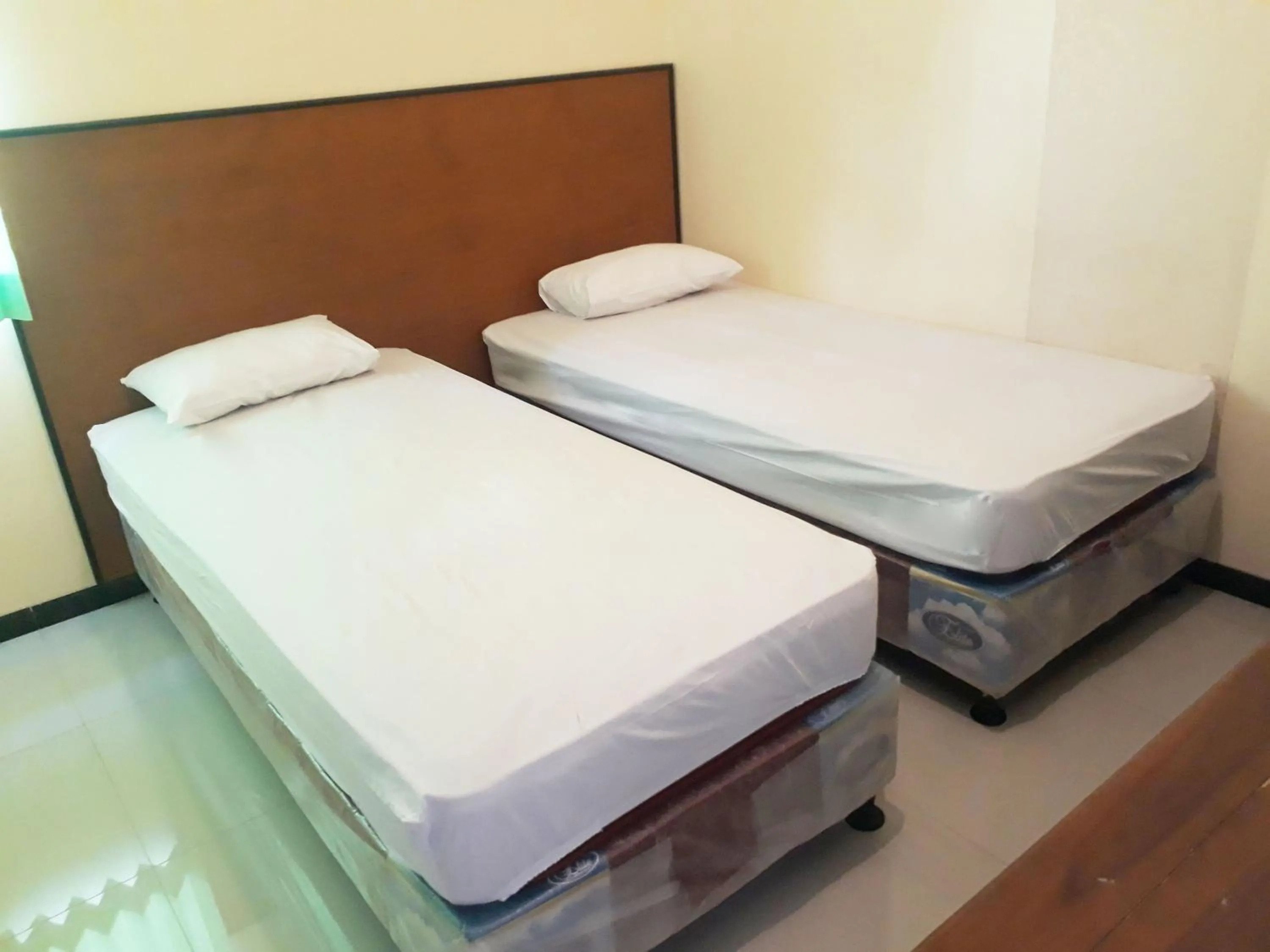 Bed in Hotel Pelangi Indah