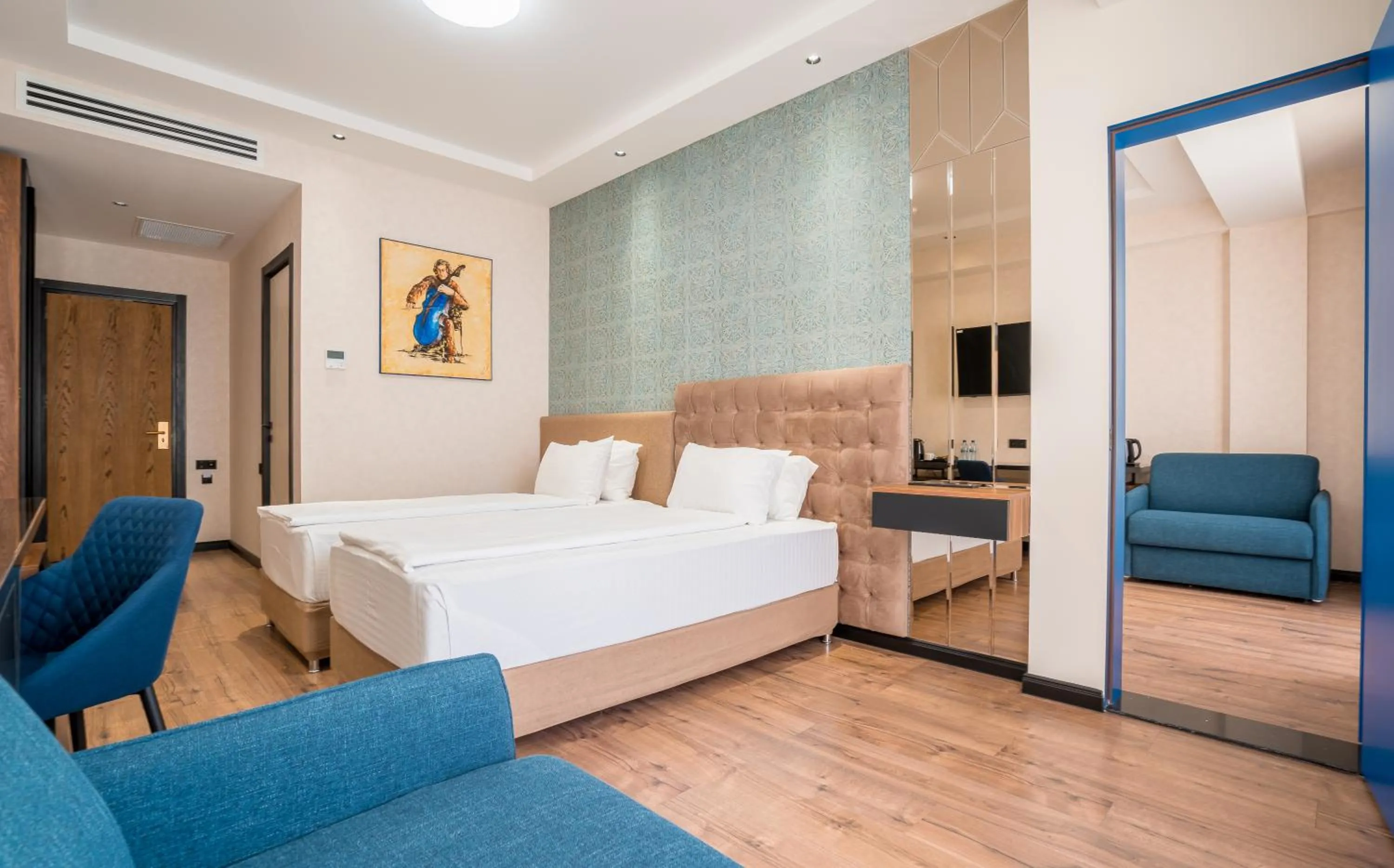 Photo of the whole room, Bed in Olympus Hotel By Umbrella