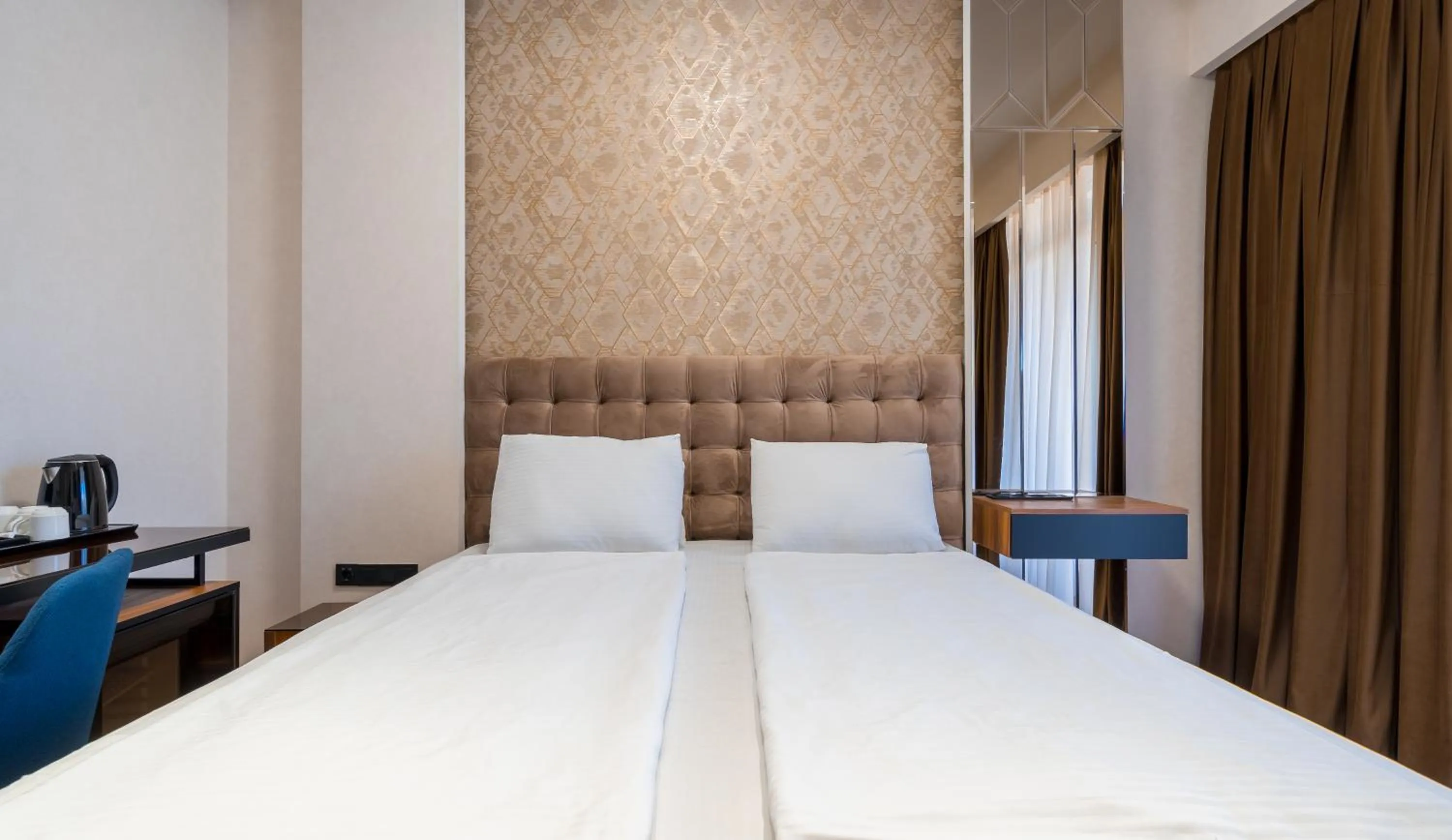 Bed in Olympus Hotel By Umbrella