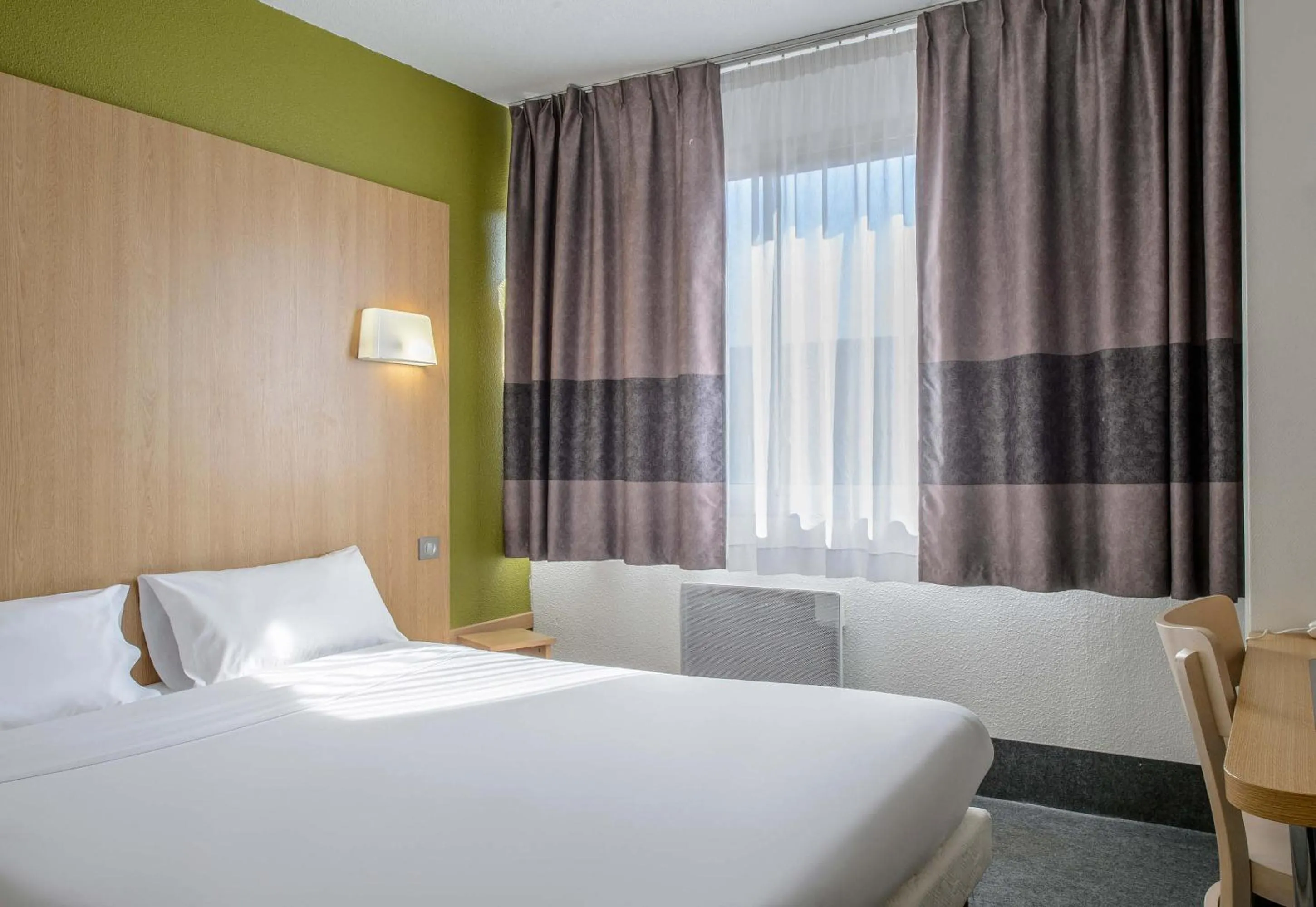 Bedroom, Bed in B&B HOTEL Nîmes Ville Active, parking sécurisé gratuit