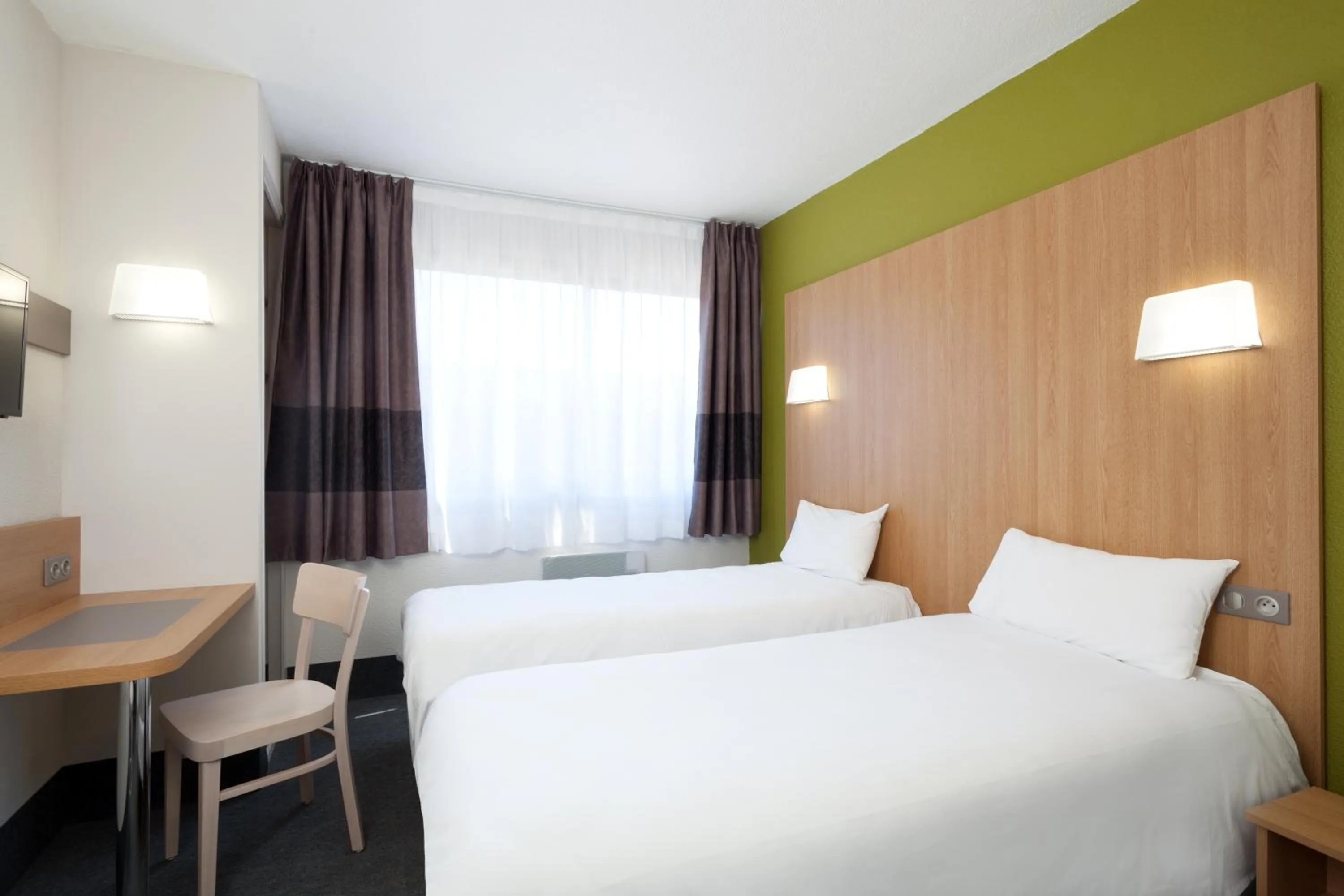Bedroom, Bed in B&B HOTEL Nîmes Ville Active, parking sécurisé gratuit