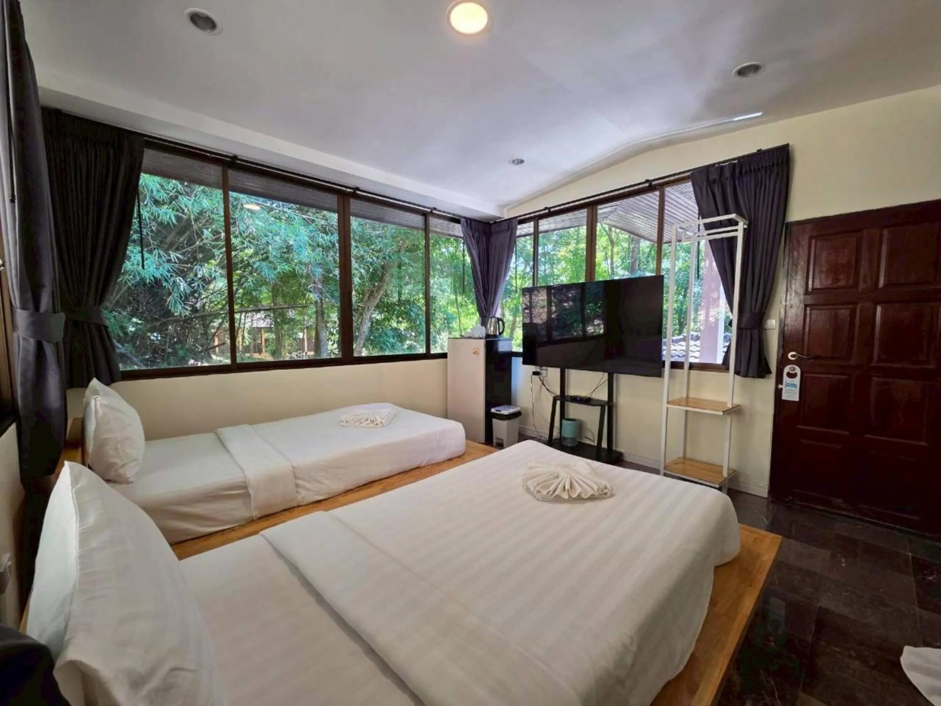 Bed in Puprai Tarnnarm Resort