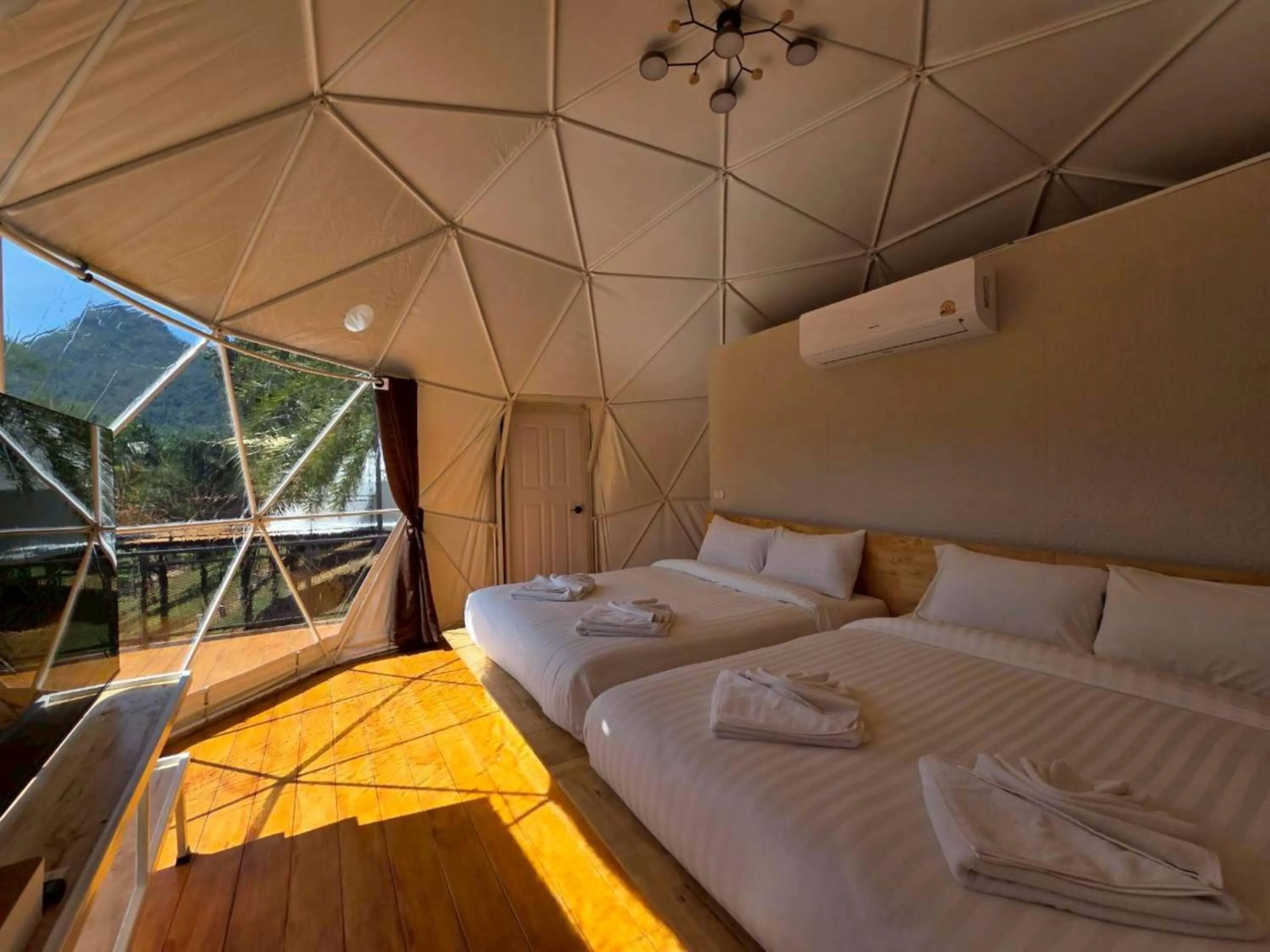 Bed in Puprai Tarnnarm Resort