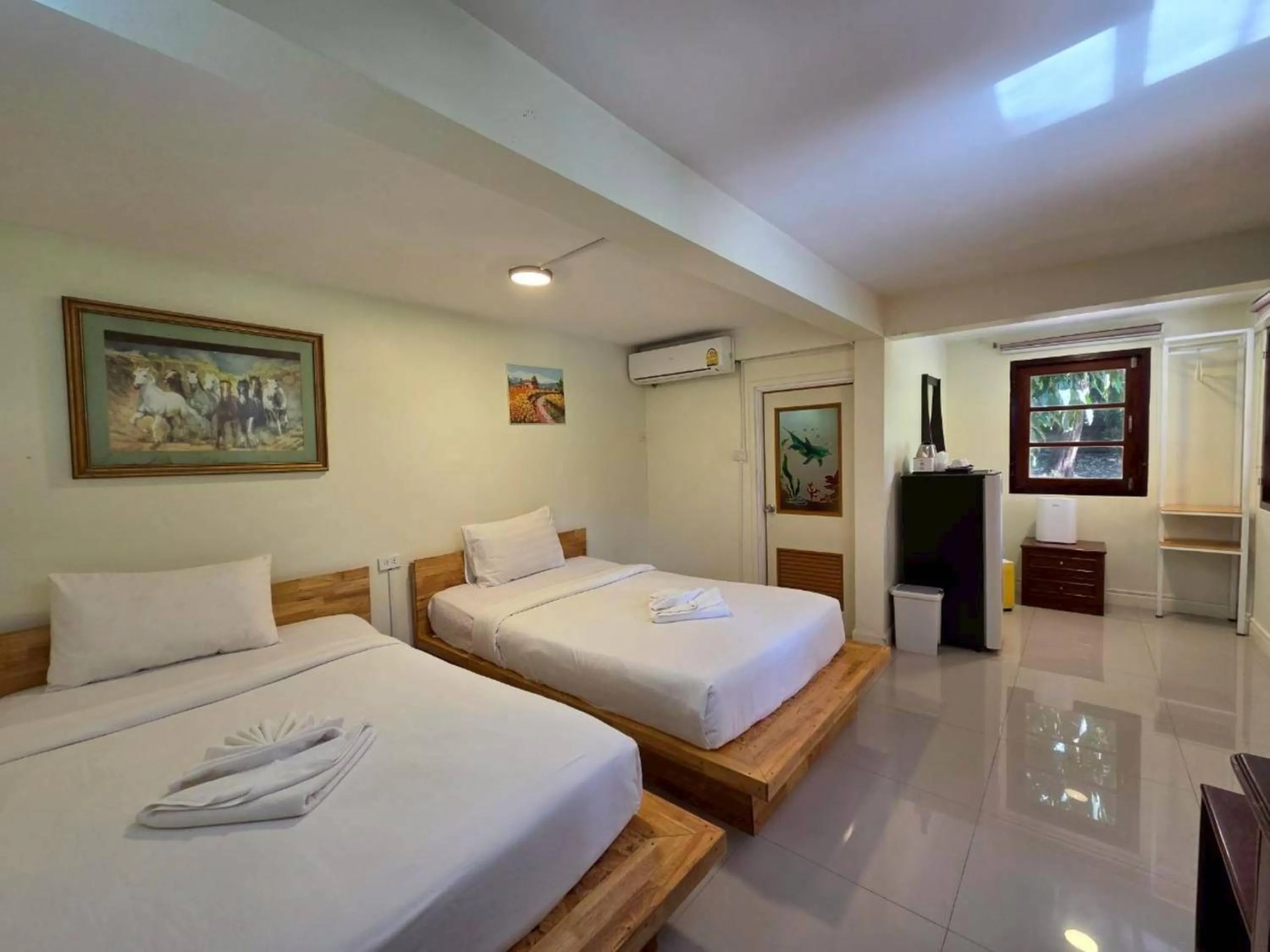 Bed in Puprai Tarnnarm Resort