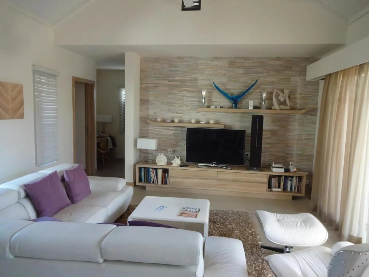 TV and multimedia in Clos du Littoral by Fine & Country