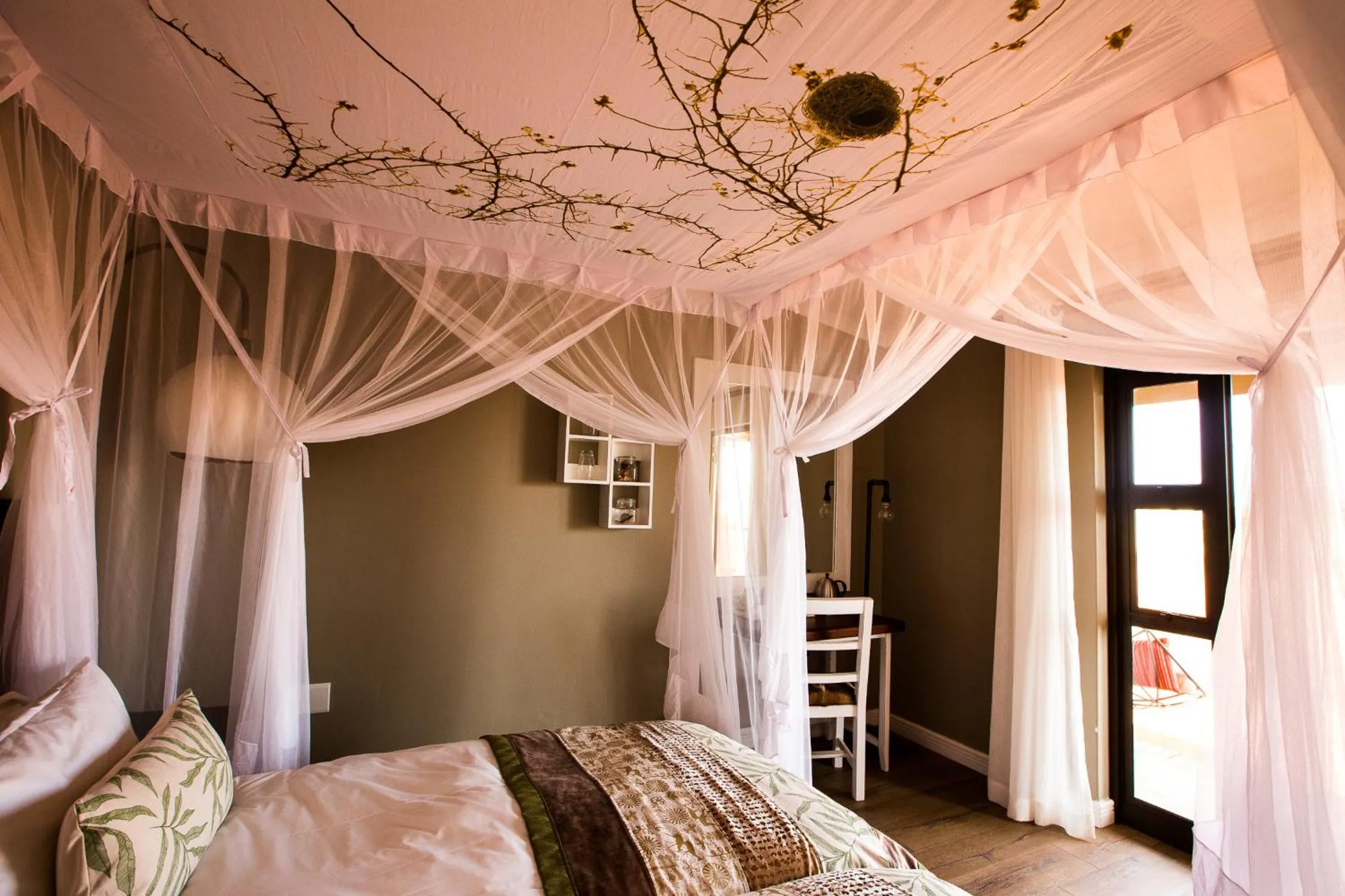 Bed in Gondwana Kalahari Anib Lodge
