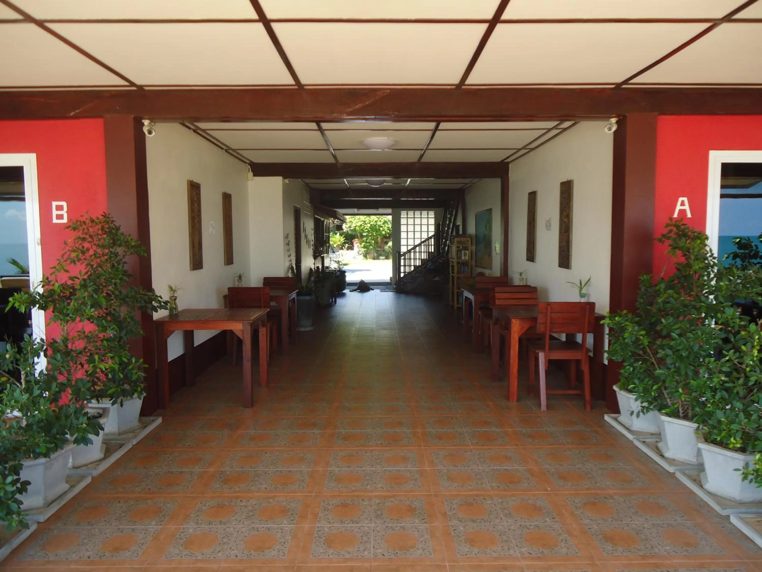 Communal lounge/ TV room in Sea Breeze House, Naiplao Beach