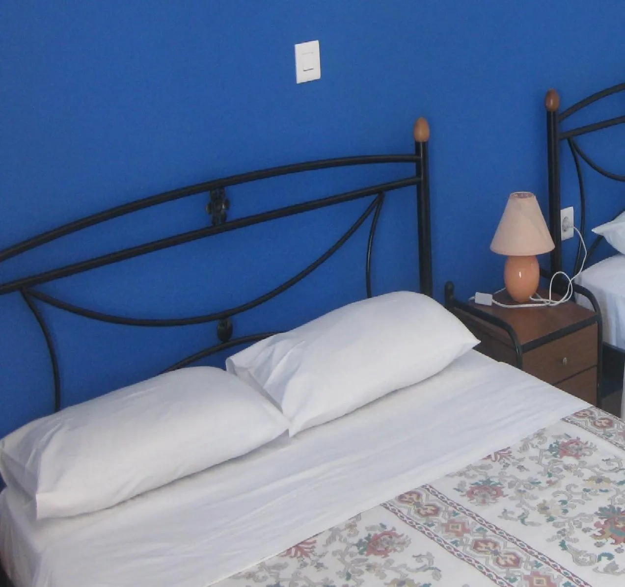 Bed in Calypso Hotel