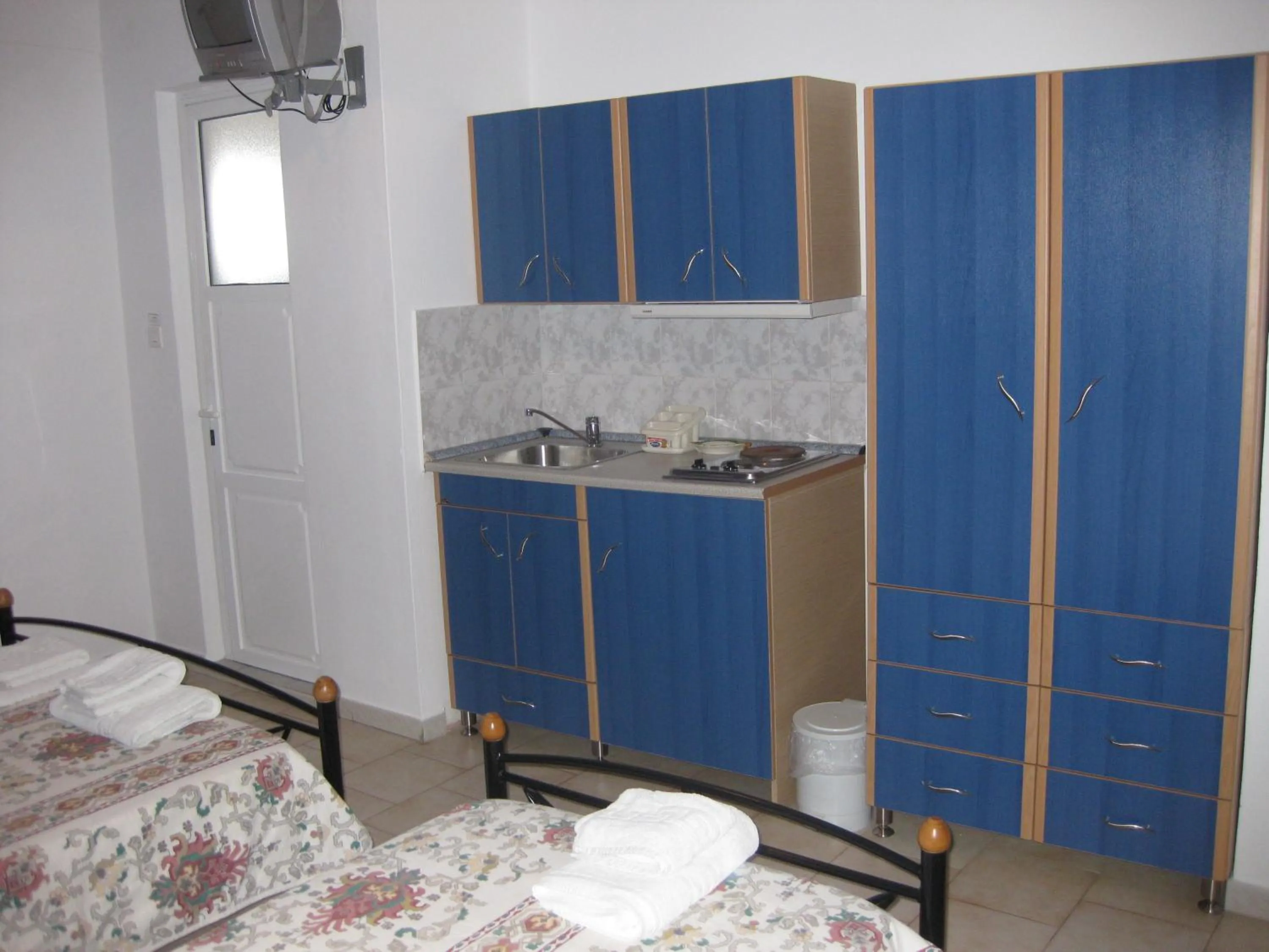Kitchen or kitchenette in Calypso Hotel