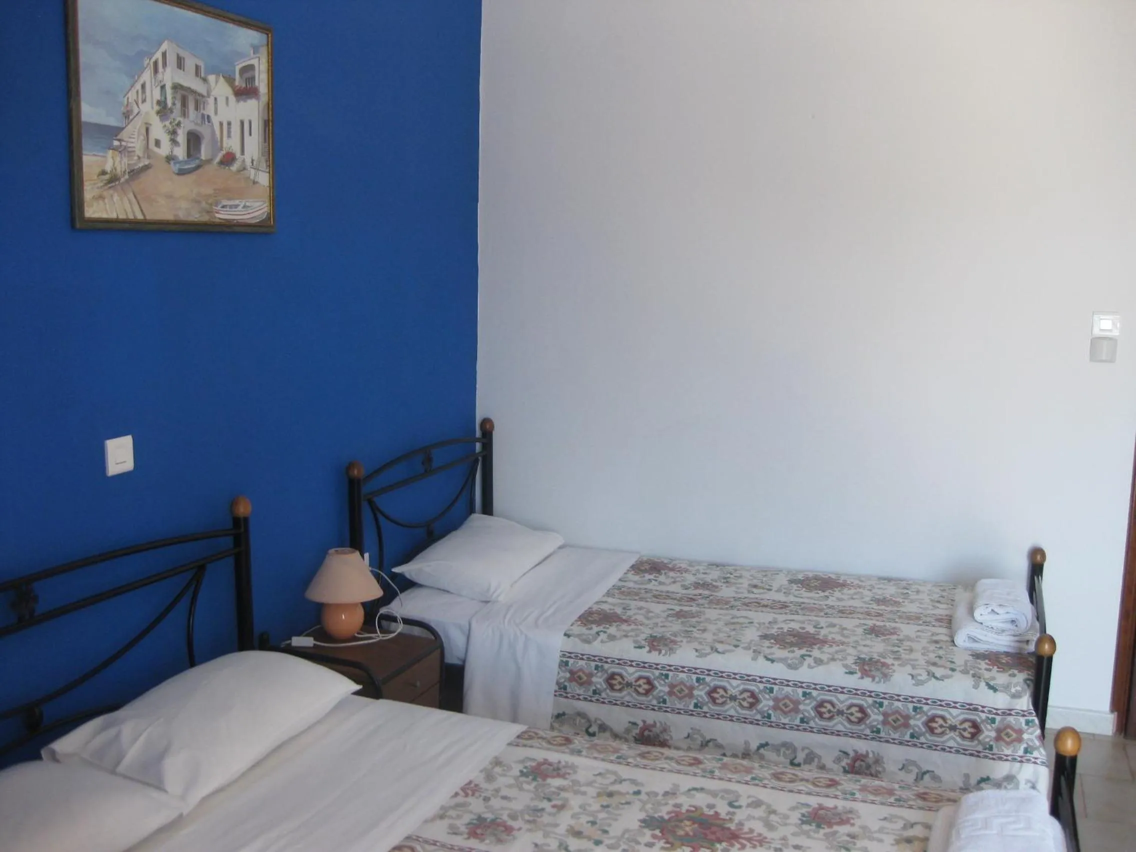 Bed in Calypso Hotel