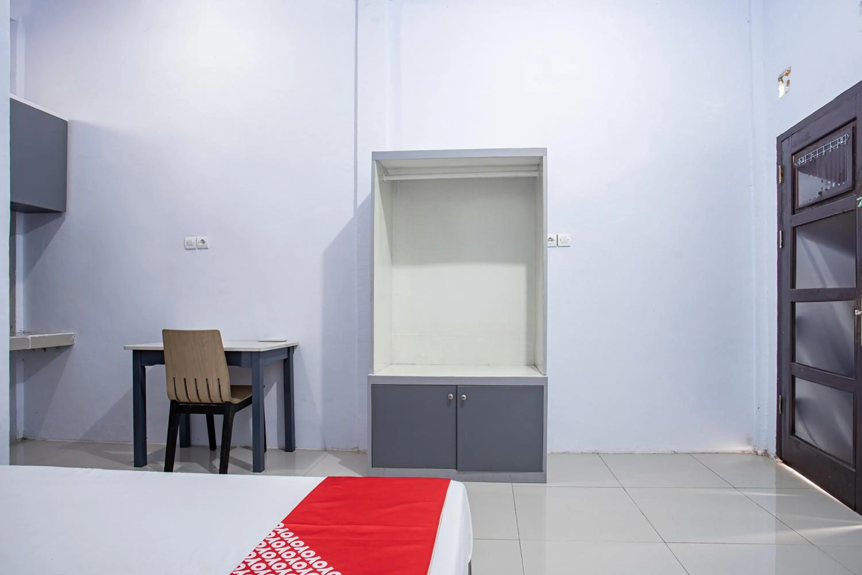 Bedroom in Hotel O Owo Guest House Syariah