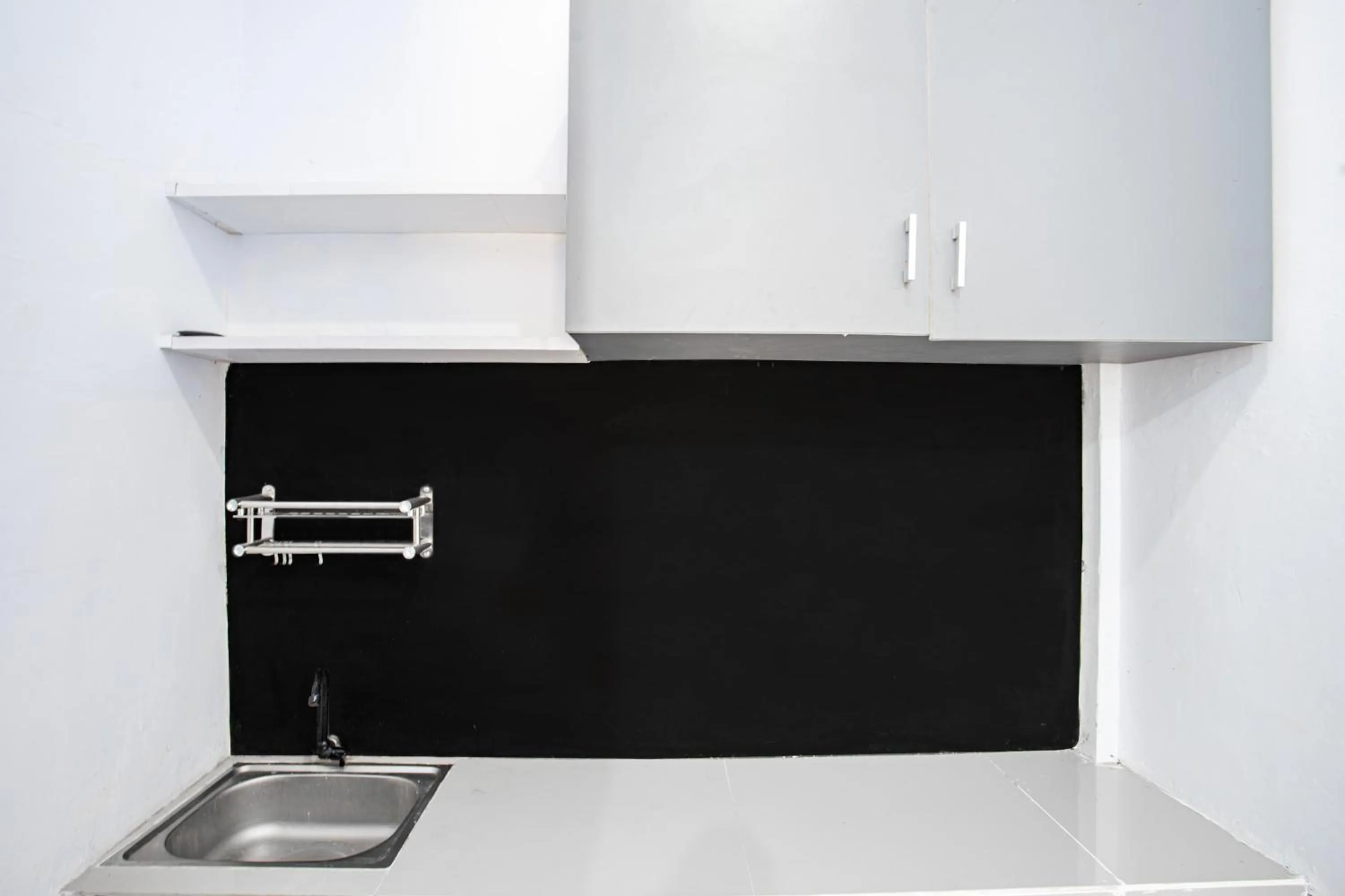 Bedroom in Hotel O Owo Guest House Syariah