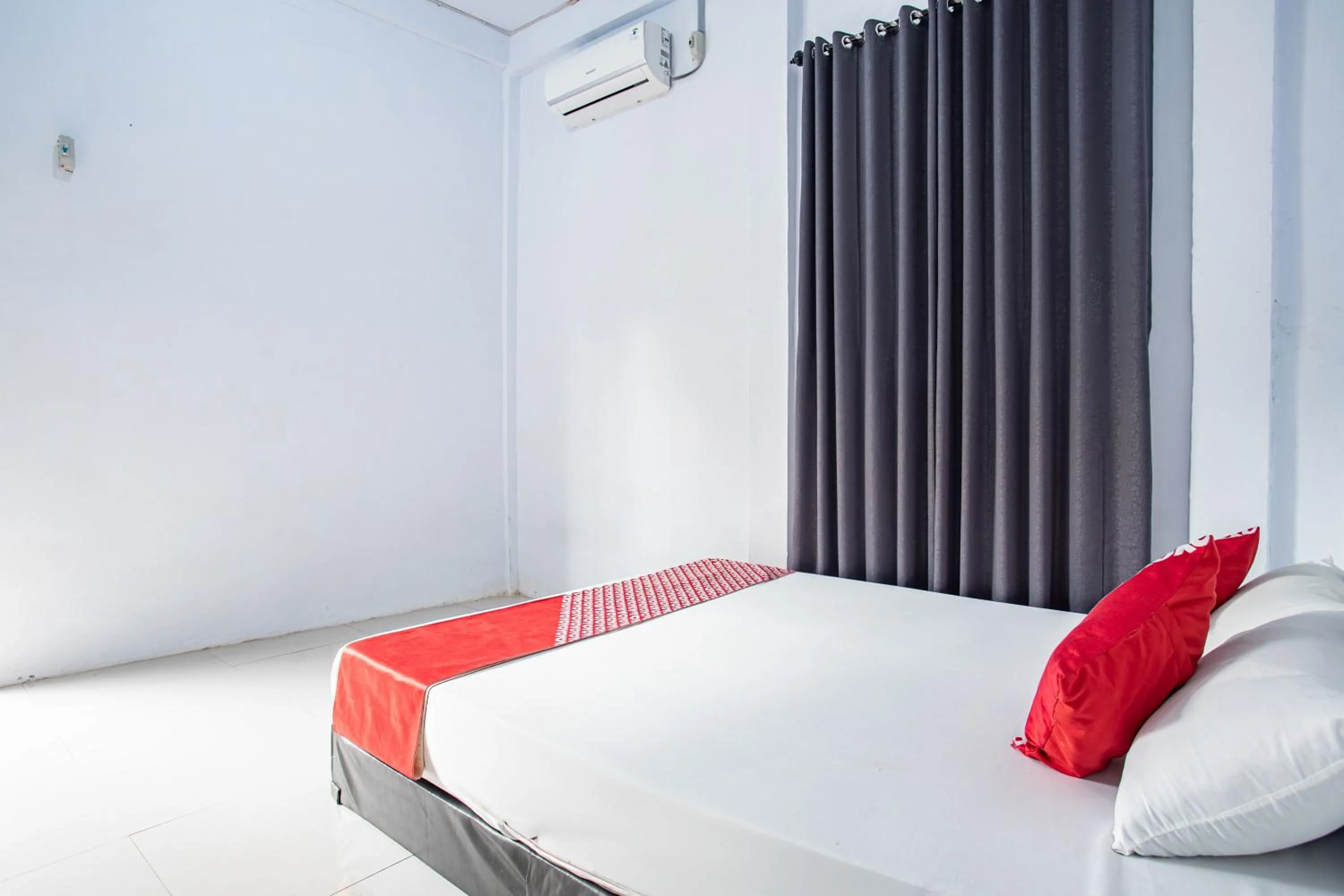 Bedroom in Hotel O Owo Guest House Syariah