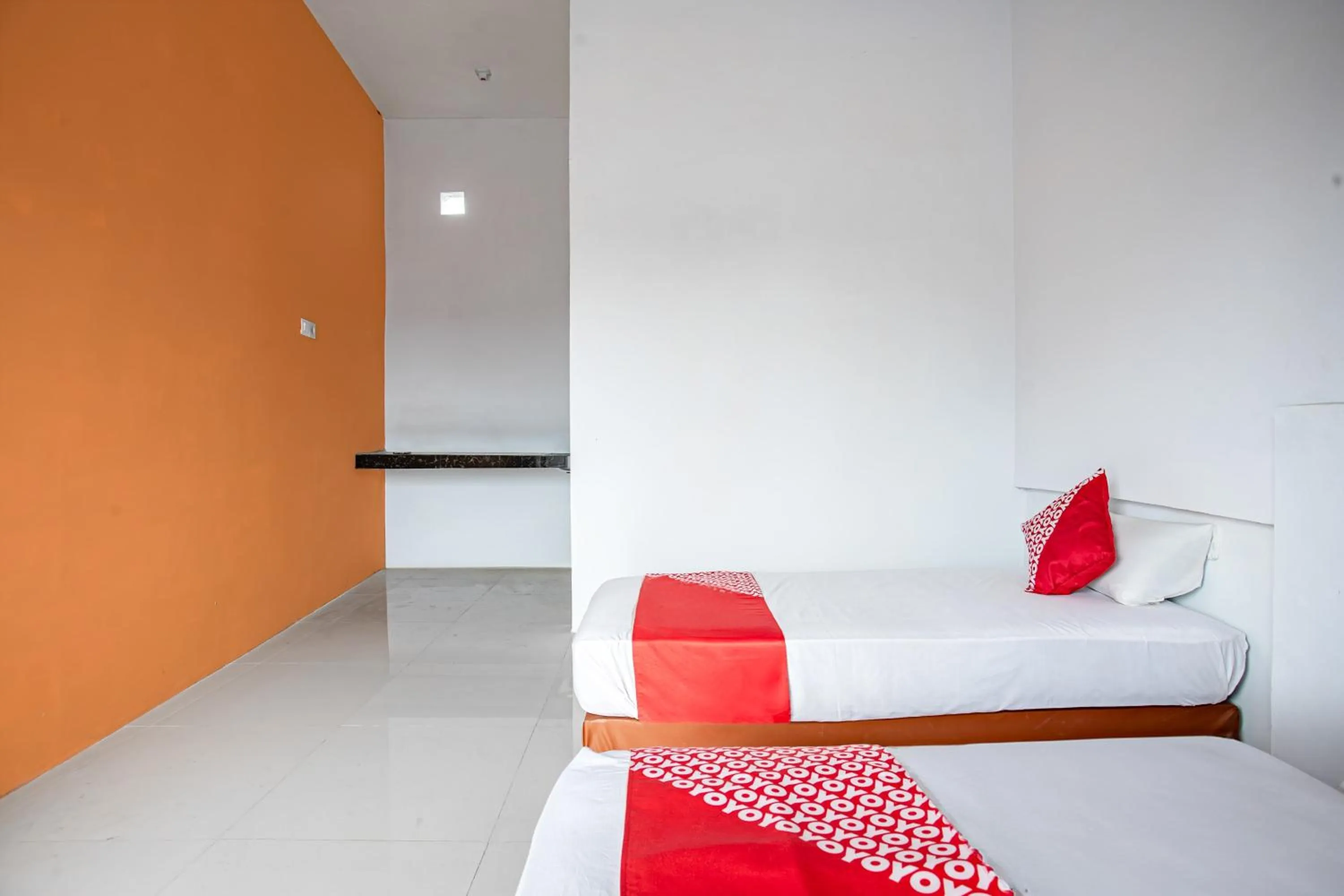 Bedroom in Hotel O Owo Guest House Syariah