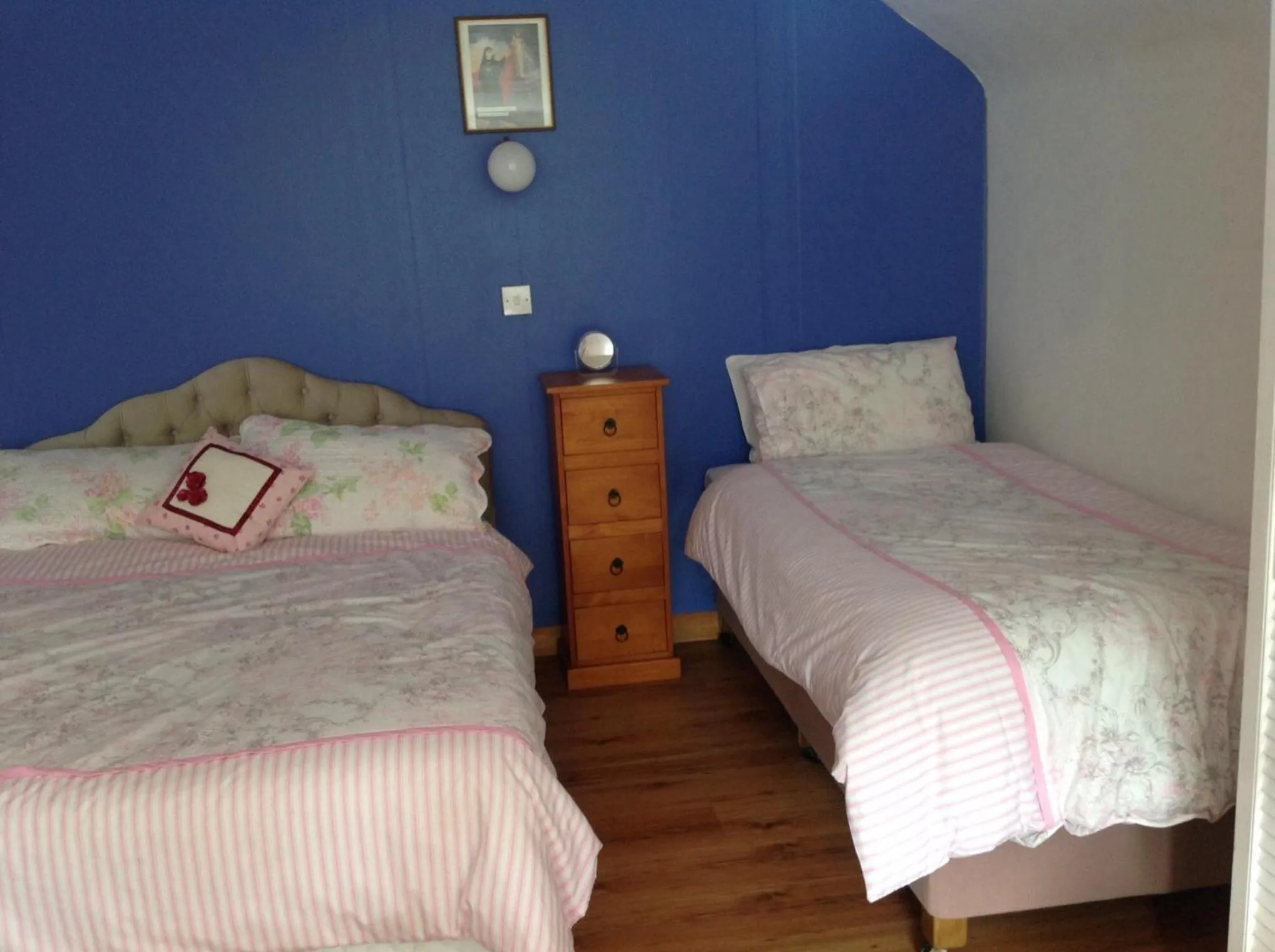 Text overlay in Divine Mercy B&B