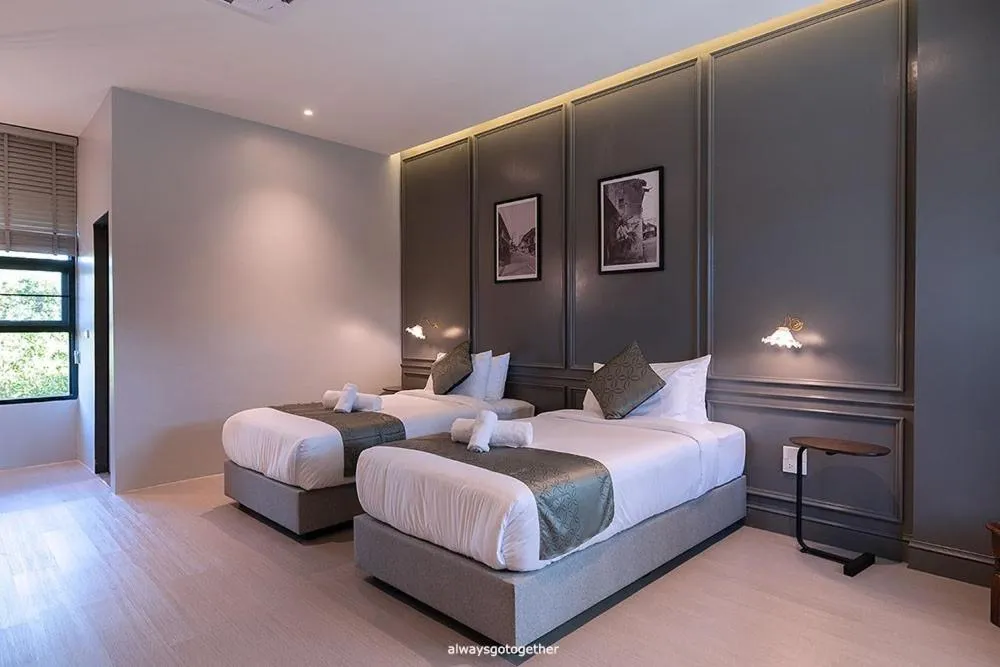 Bed in Pattanipirom Boutique Hotel