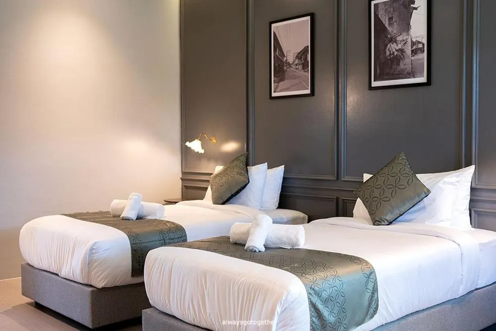 Bed in Pattanipirom Boutique Hotel