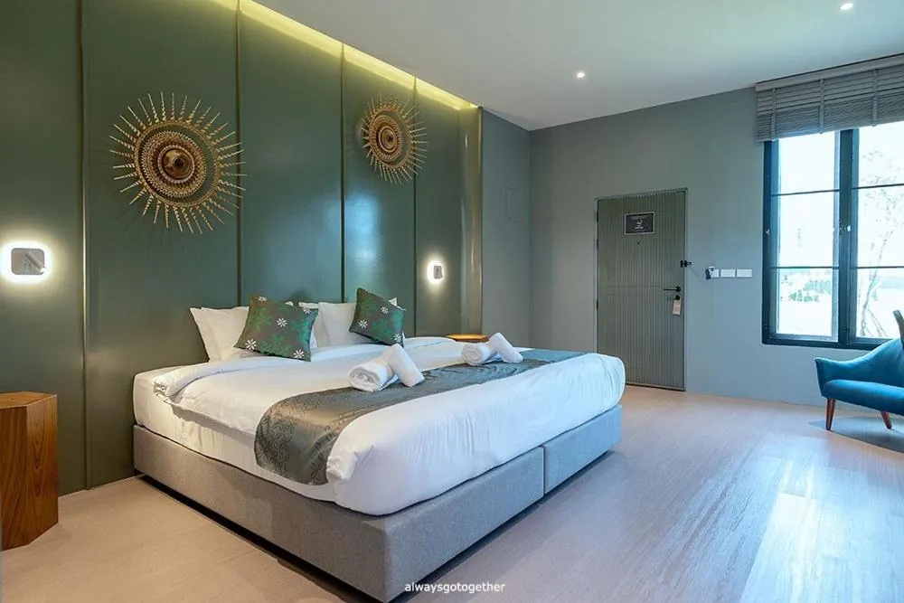 Bed in Pattanipirom Boutique Hotel