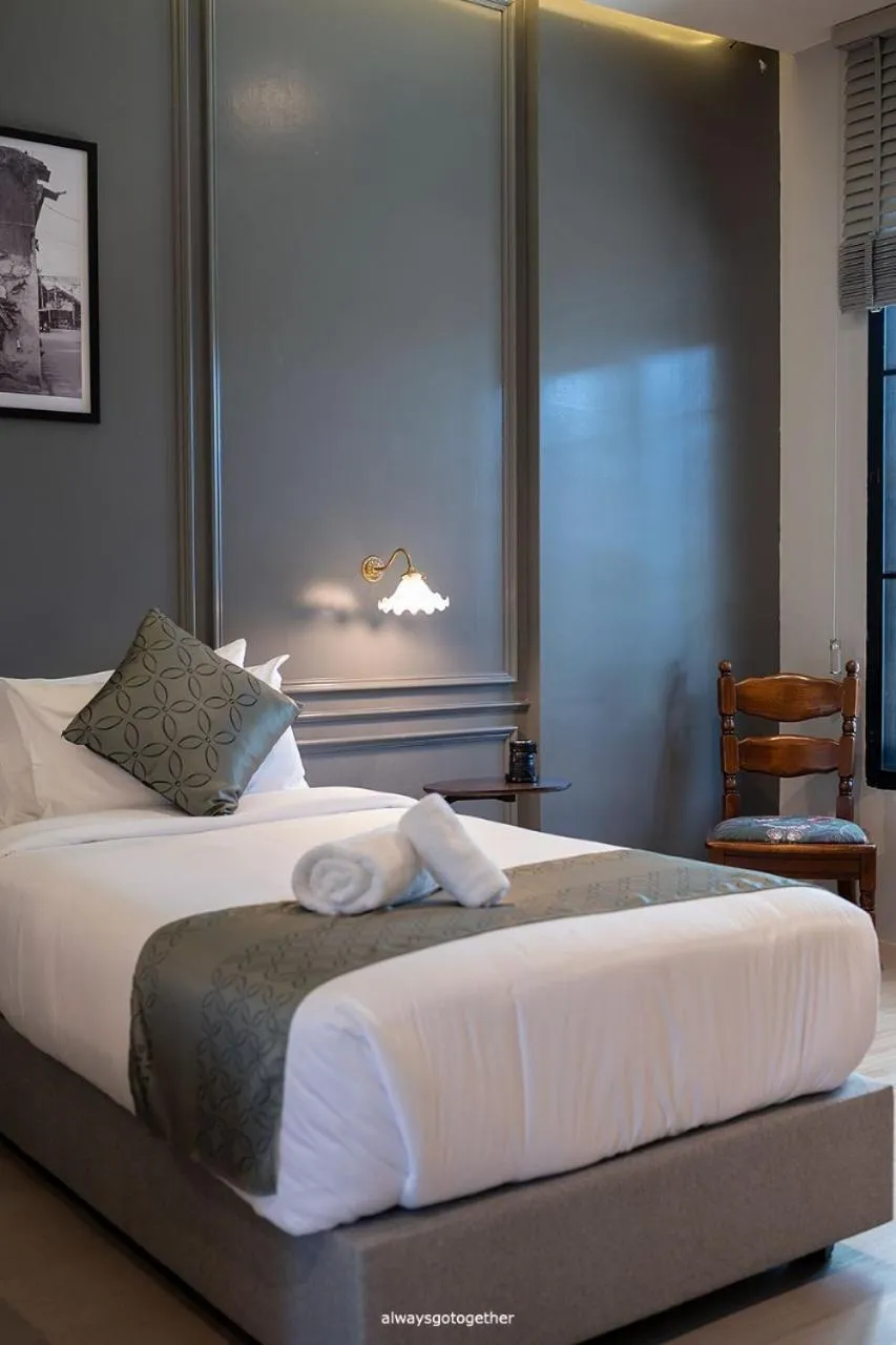 Bed in Pattanipirom Boutique Hotel