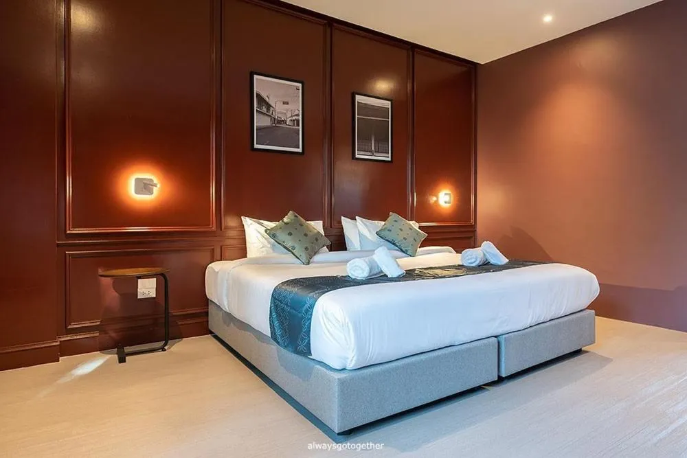 Bed in Pattanipirom Boutique Hotel