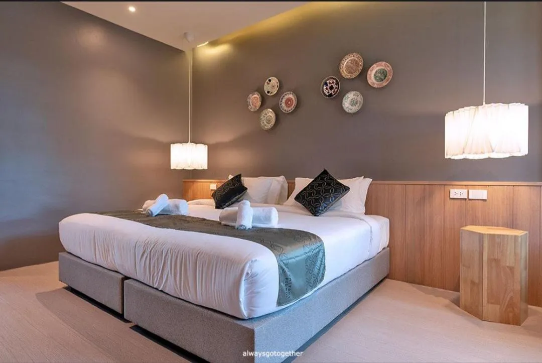 Bed in Pattanipirom Boutique Hotel