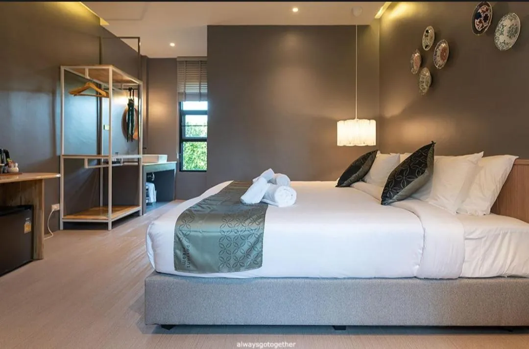 Bed in Pattanipirom Boutique Hotel