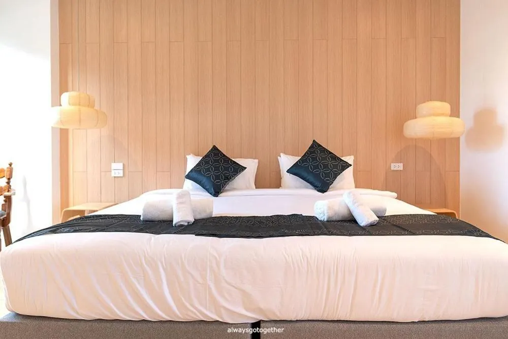 Bed in Pattanipirom Boutique Hotel