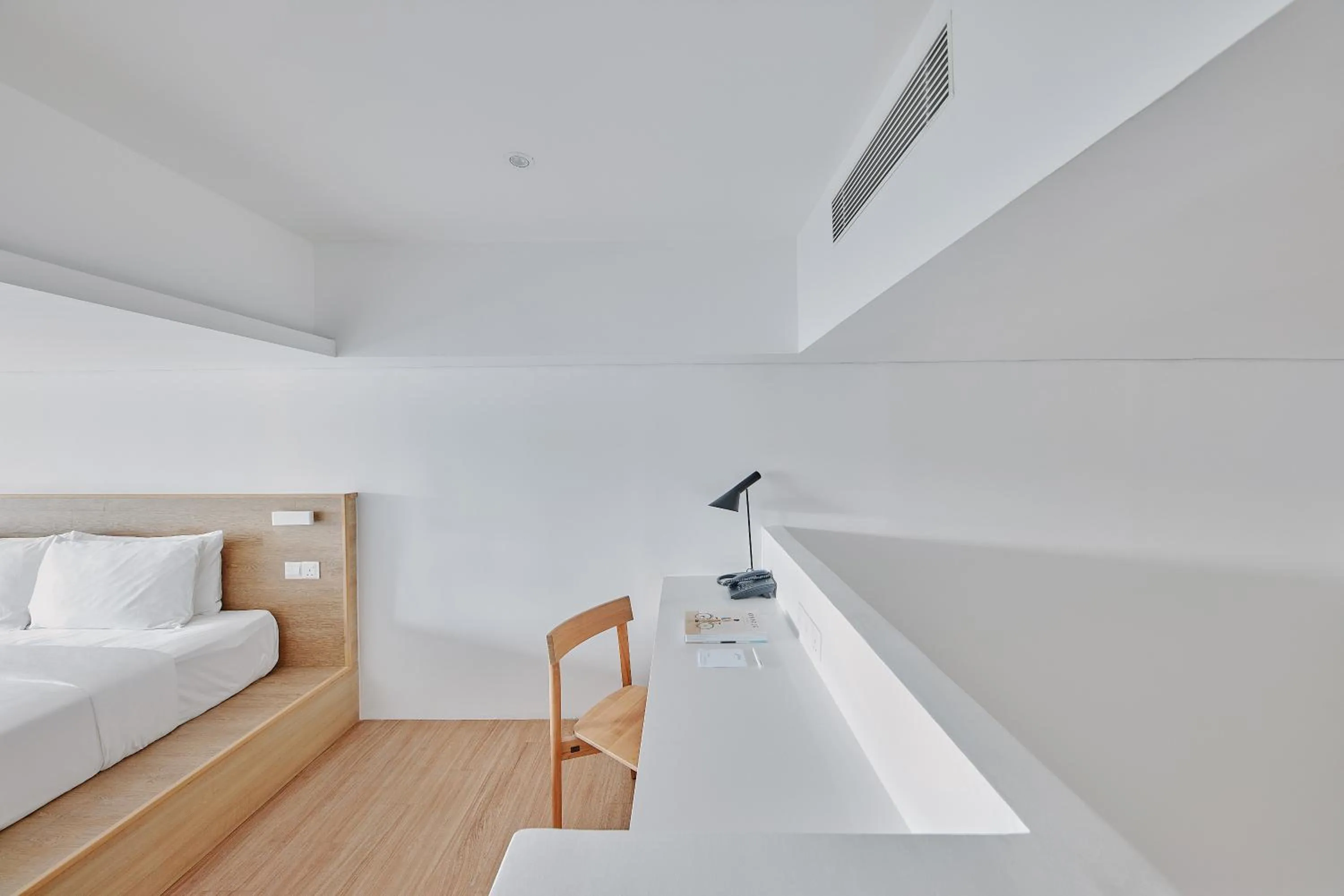 Bed in Lloyd's Inn Kuala Lumpur