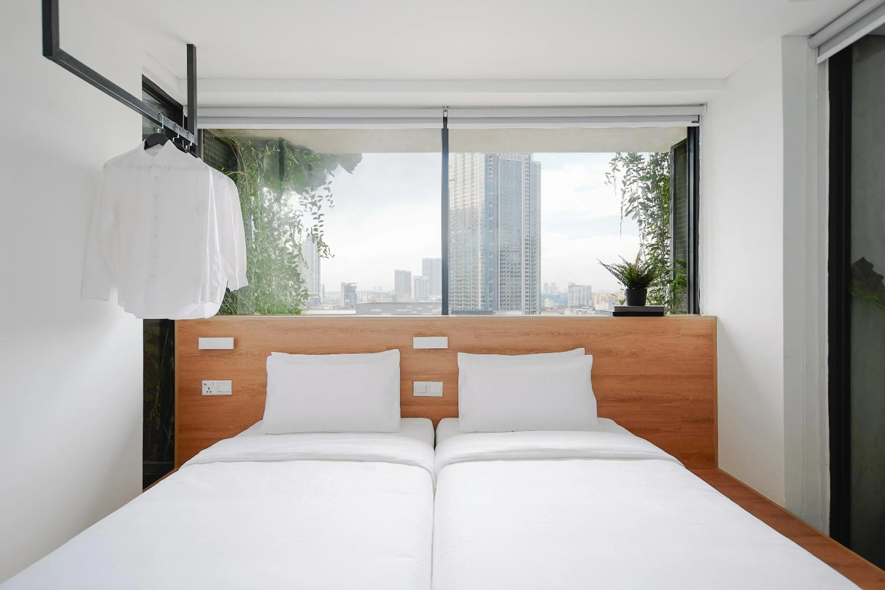 Bed in Lloyd's Inn Kuala Lumpur