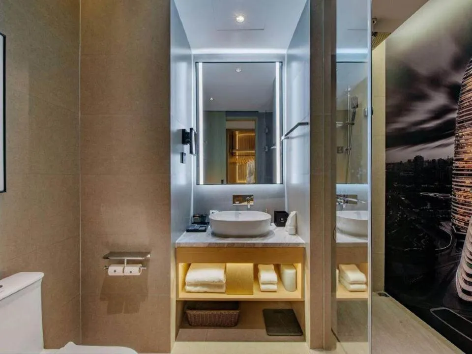 Bathroom in Park Inn by Radisson Chongqing Yuelai International Expo Center