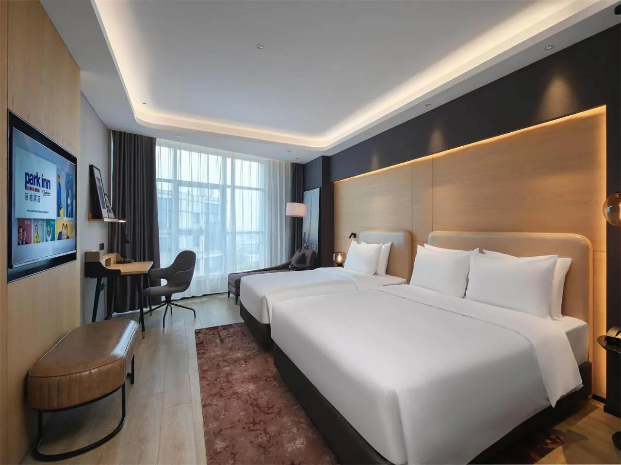 Photo of the whole room, Bed in Park Inn by Radission Tianjin Binhai International Airport