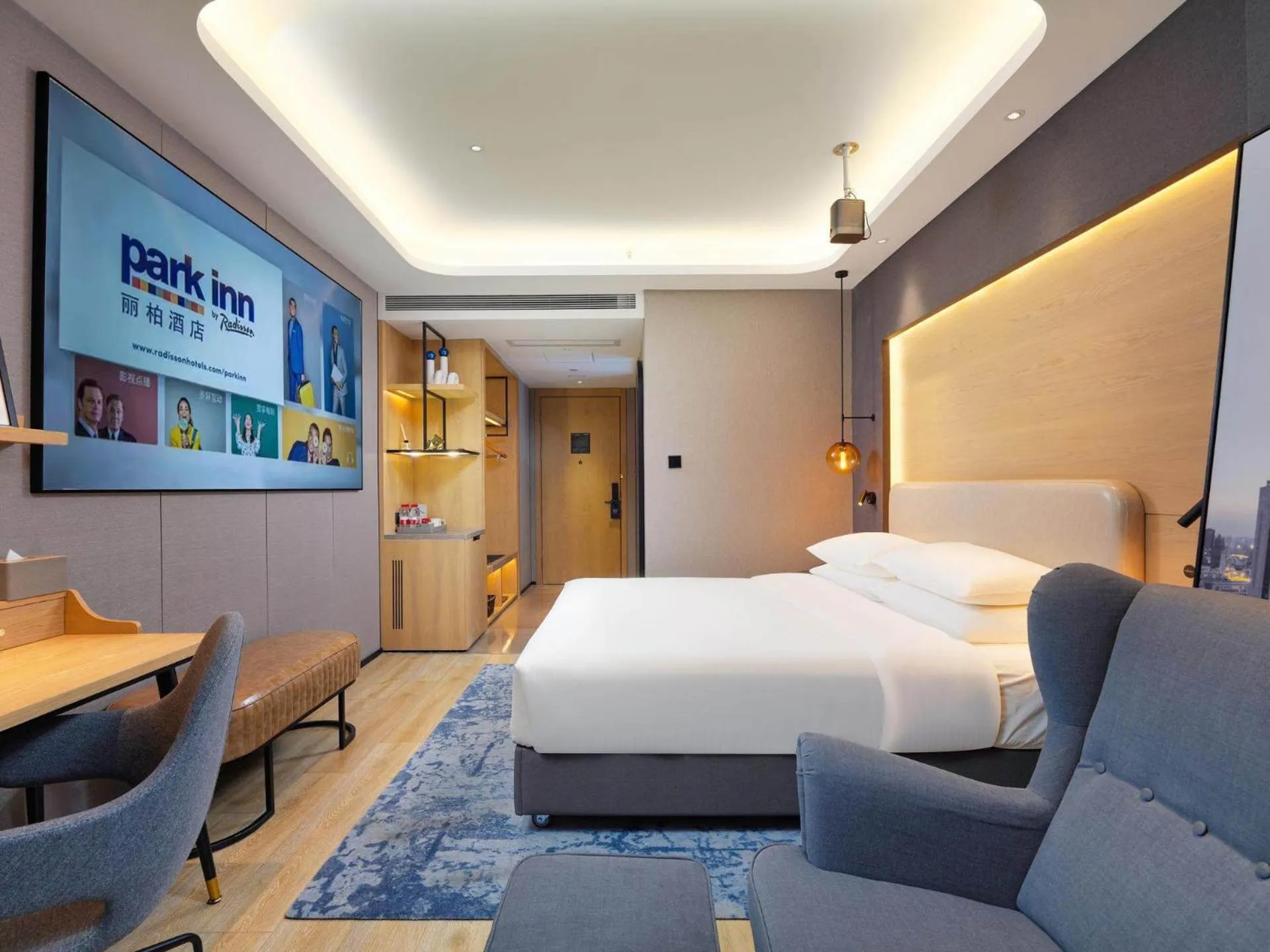 Seating area, Bed in Park Inn by Radission Tianjin Binhai International Airport