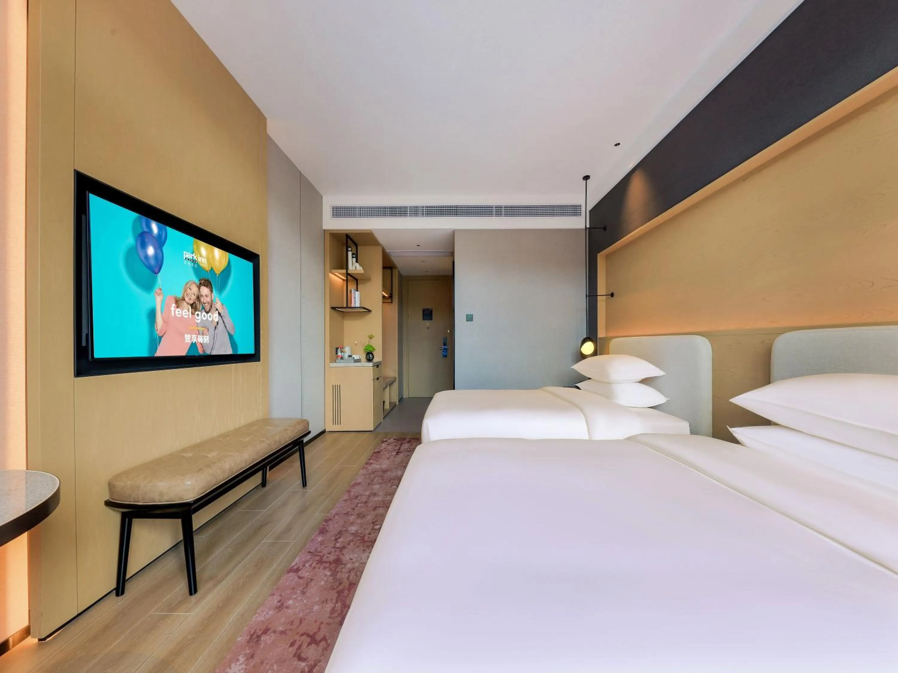 Photo of the whole room, Bed in Park Inn by Radisson Zhuhai Gaolan Port