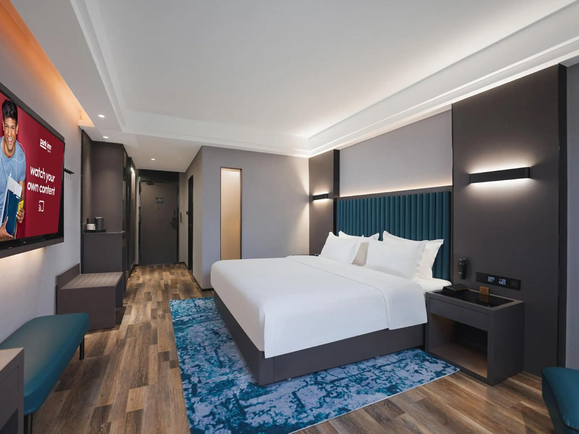 Bed in Park Inn by Radisson Hanzhong Central Square & High speed rail station