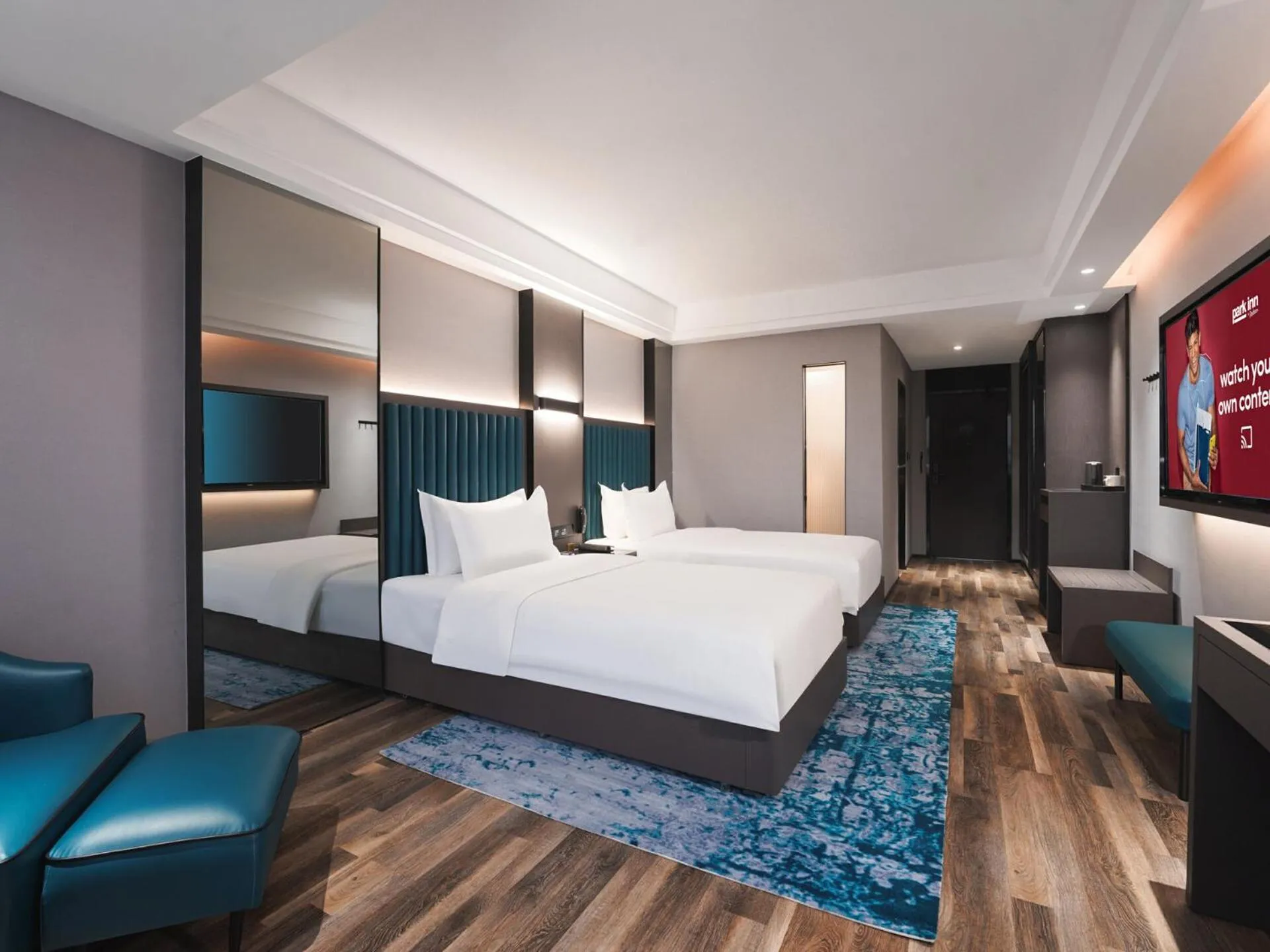 Bed in Park Inn by Radisson Hanzhong Central Square & High speed rail station
