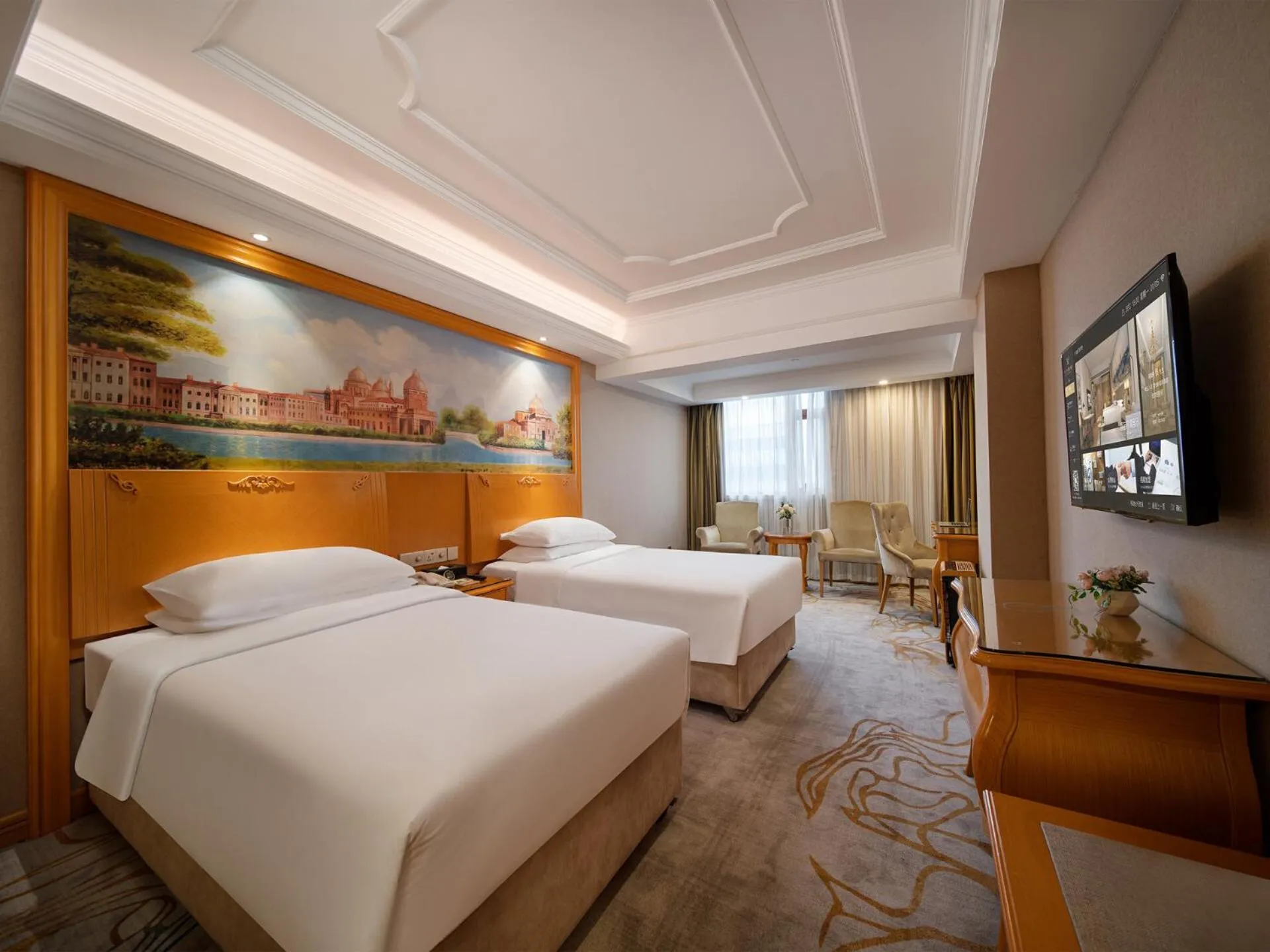 Bed in Vienna International Hotel Shenzhen Longhua Xiken