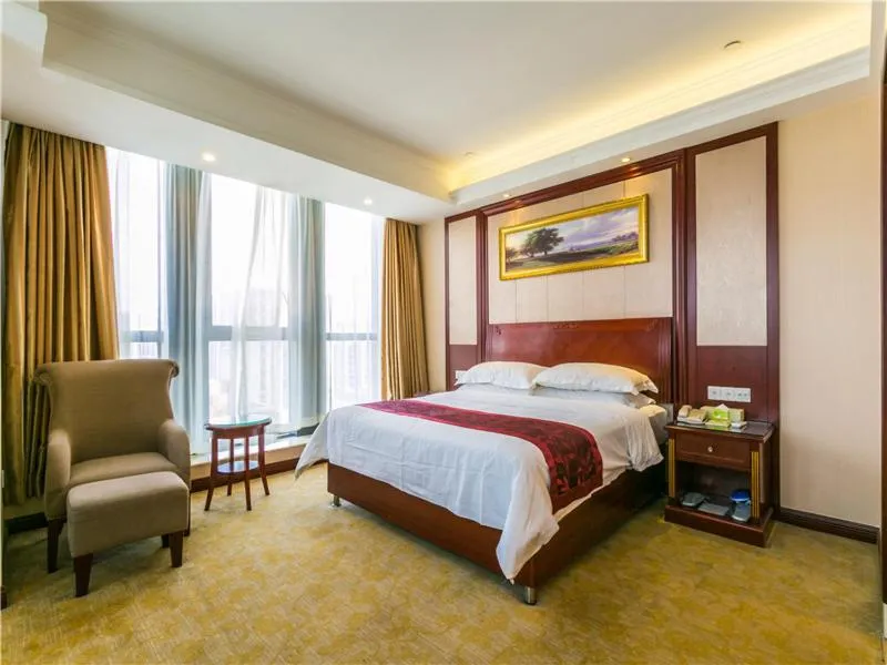 Bed in Vienna International Hotel Shanghai Hongqiao Airport Convention and Exhibition Center Huaxu Highway