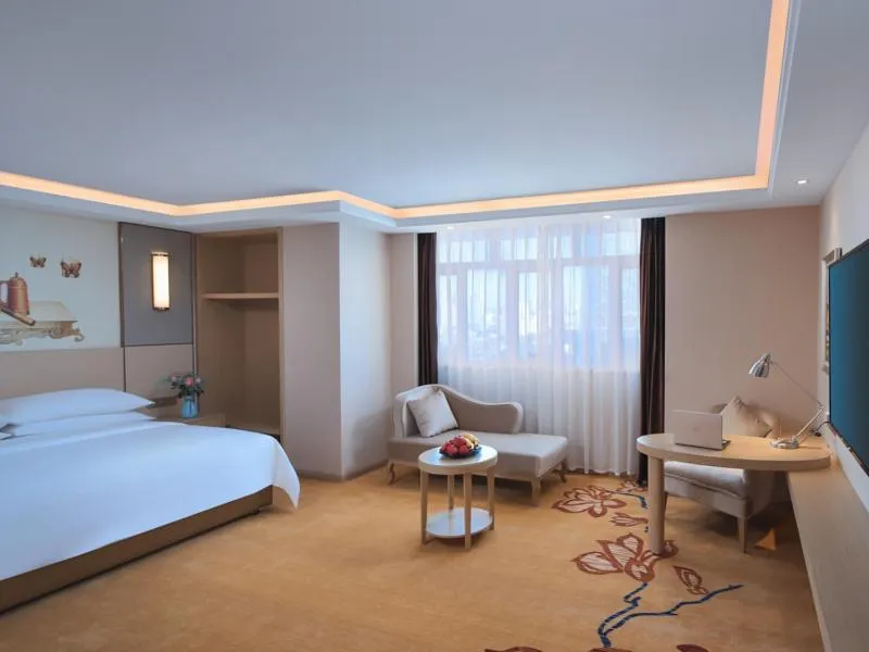 Bed in Vienna International Hotel FuJian PuTian Pearl