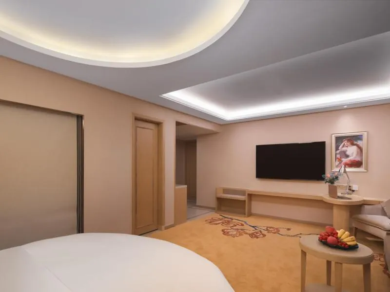 Bed in Vienna International Hotel FuJian PuTian Pearl