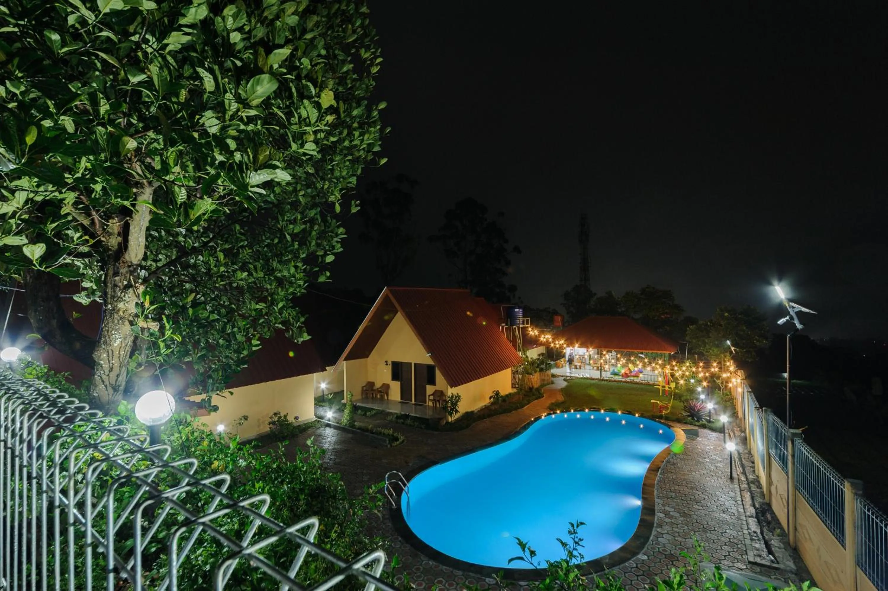 Swimming pool in Urbanview Hotel Nerine's Glamping Village Cipanas by RedDoorz