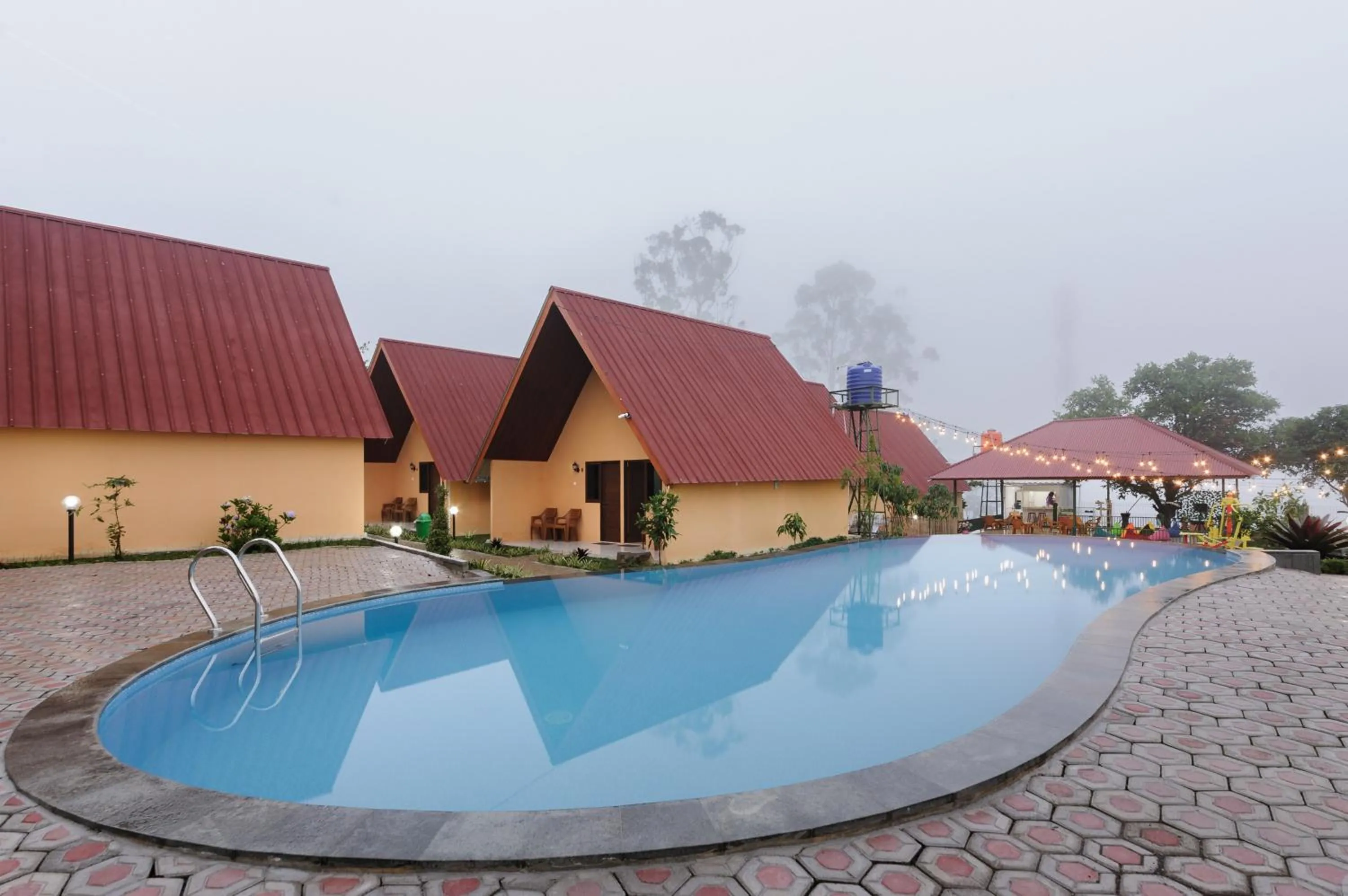 Swimming pool in Urbanview Hotel Nerine's Glamping Village Cipanas by RedDoorz