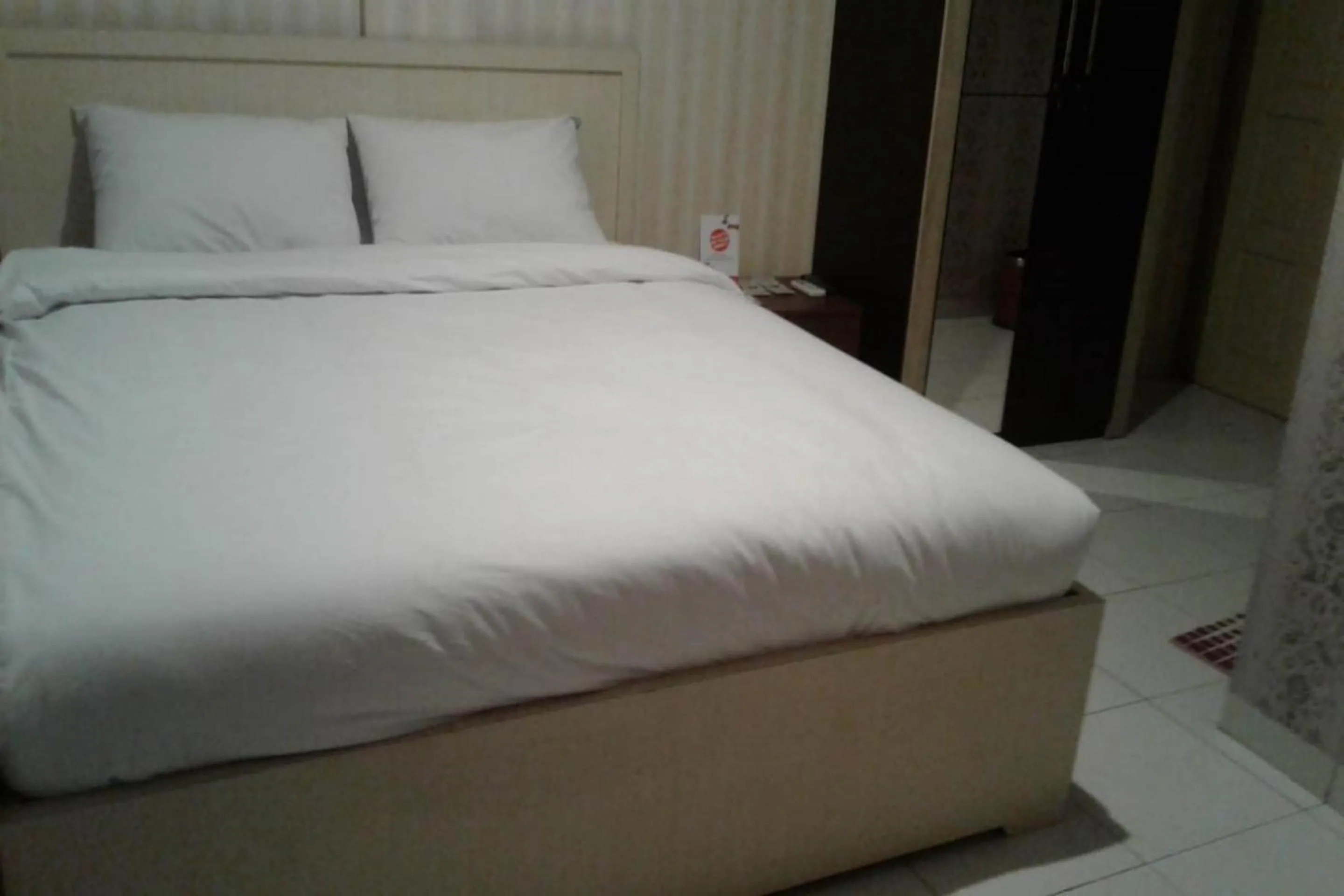 Bedroom, Bed in OYO 93485 Hotel Kenzie Sentani